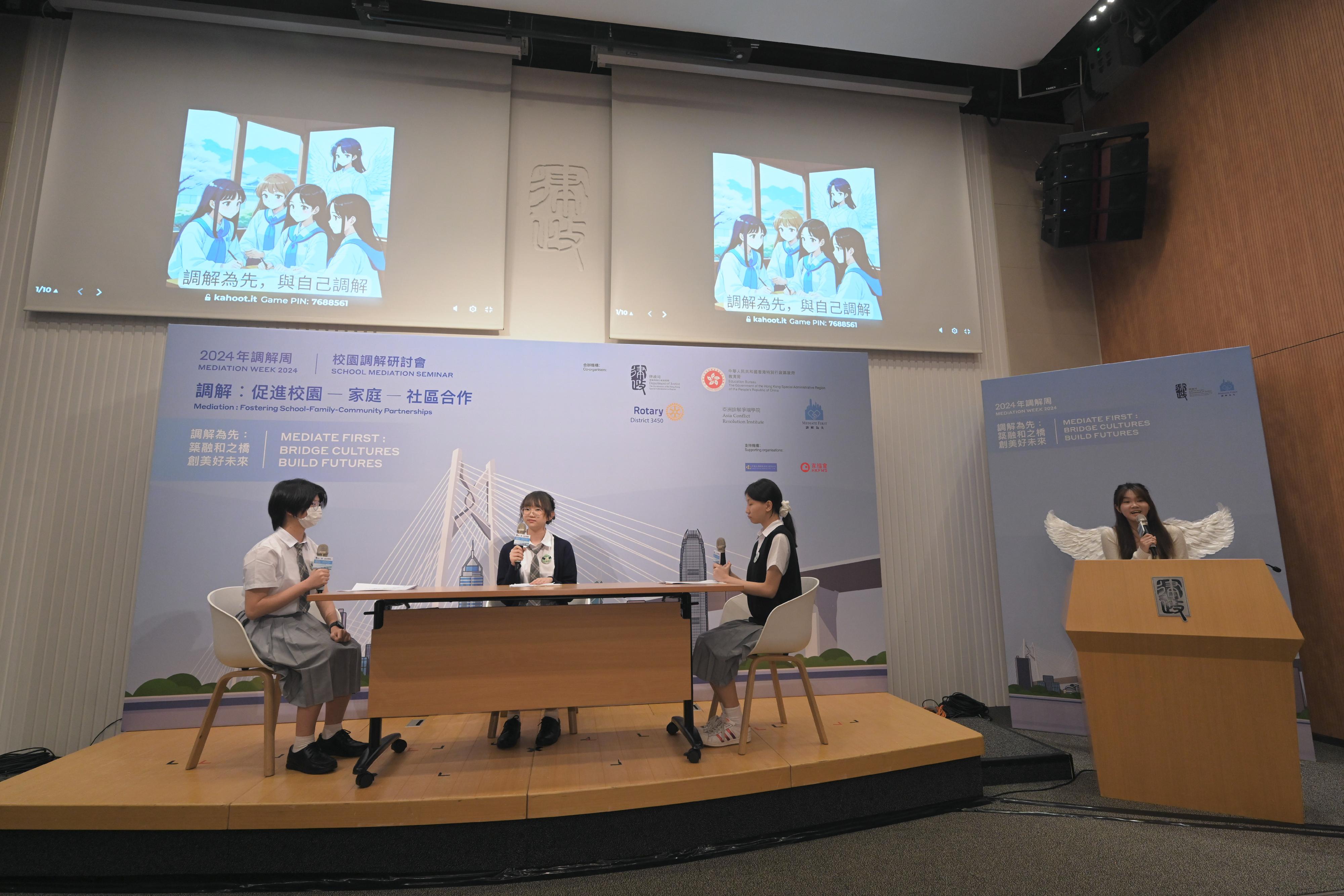 The Mediation Week 2024, a biennial event organised by the Department of Justice, was officially launched today (May 6). The Mediation Week opening was marked by the thematic event: School Mediation Seminar this morning. Photo shows "Mediate First" student pledgees performing in a drama to demonstrate the use of mediation in the school context.
