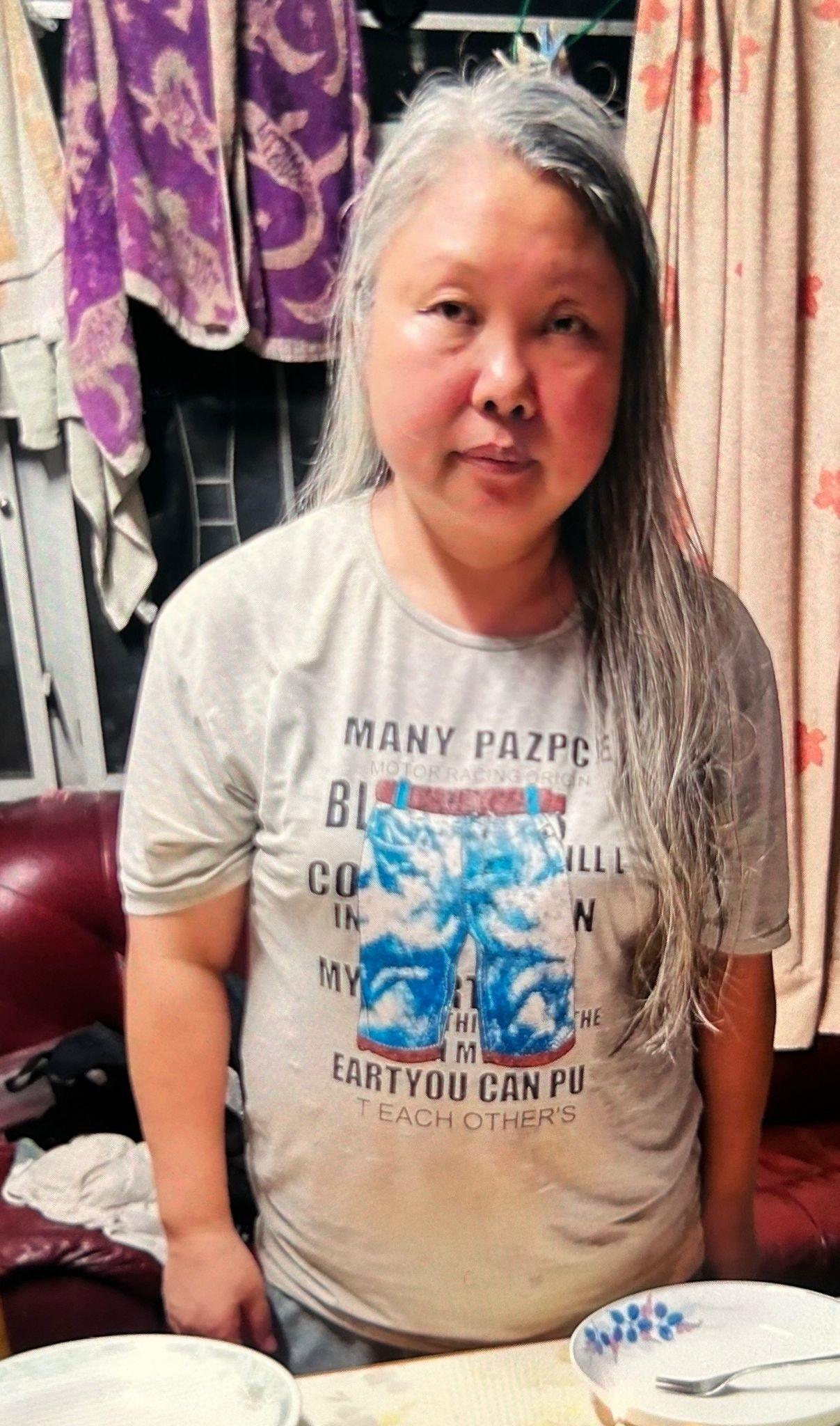 Chan Yiu-lin, aged 54, is about 1.6 metres tall, 82 kilograms in weight and of fat build. She has a round face with yellow complexion and long straight grey and white hair. She was last seen wearing a grey T-shirt, blue trousers, white shoes and carrying a red backpack, a beige recycle bag, a brown recycle bag and a bl