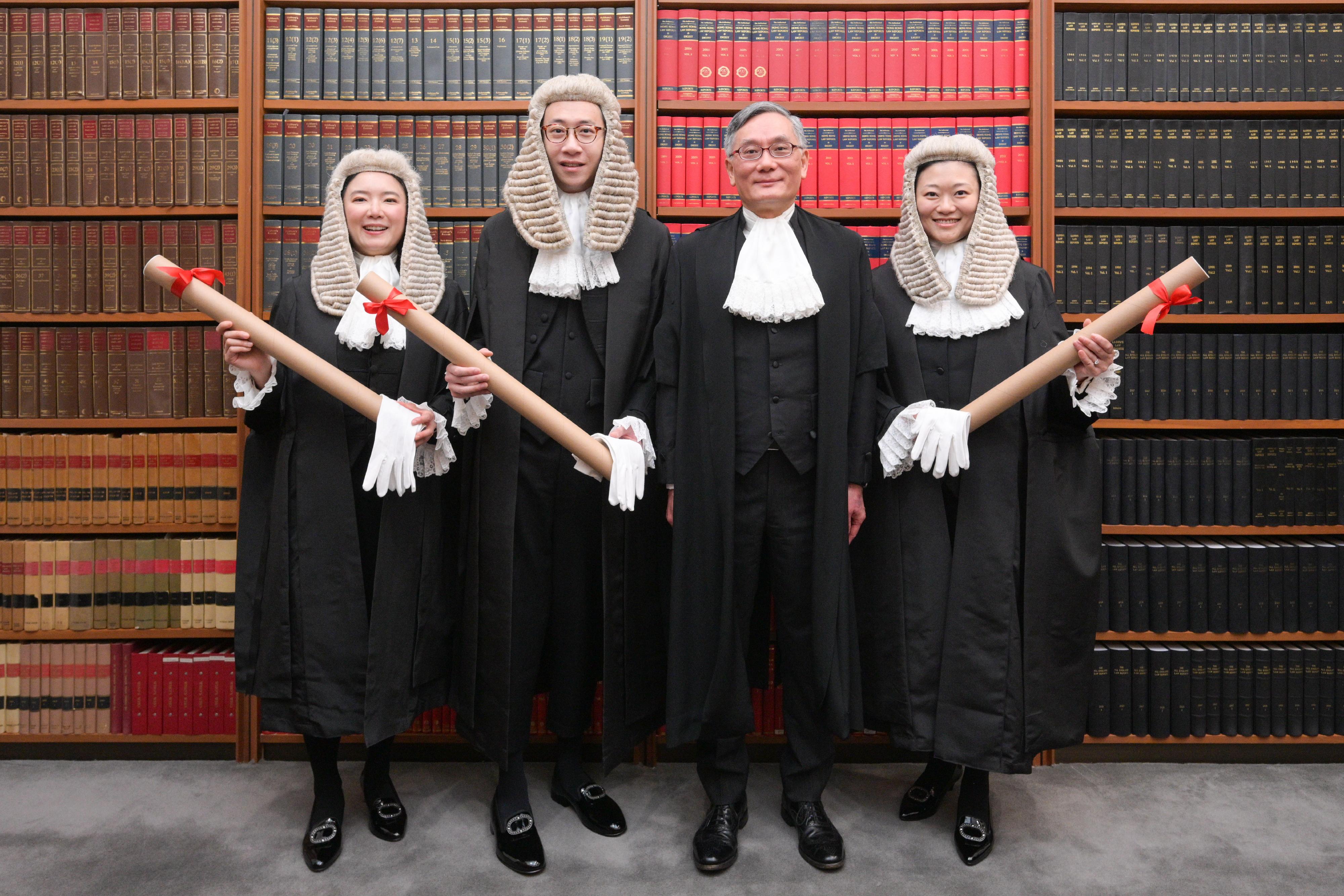 The ceremonial proceedings for the admission of newly appointed Senior Counsel took place at the Court of Final Appeal today (May 11). Photo shows Chief Justice Andrew Cheung Kui-nung, Chief Justice of the Court of Final Appeal (second right), with the newly appointed Senior Counsel Mr Benson Tsoi (second left), Ms Frances Lok (first right), and Miss Queenie Lau (first left).