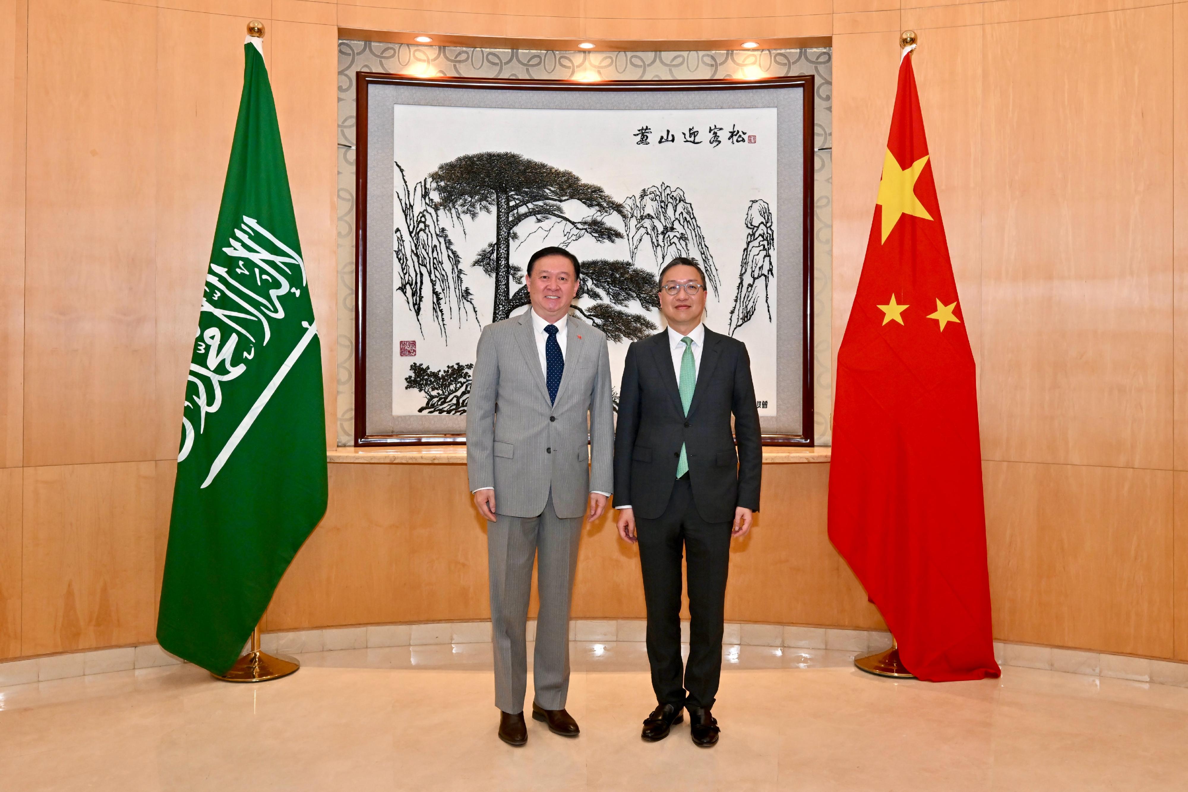 The Secretary for Justice, Mr Paul Lam, SC, arrived in Riyadh, Saudi Arabia, on May 19, Riyadh time with his about 30-person delegation, comprising representatives from the Law Society of Hong Kong, the Hong Kong Bar Association, the Hong Kong Exchanges and Clearing Limited, Invest Hong Kong and related sectors, and began a two-day visit to the city. Photo shows Mr Lam (right) with the Ambassador Extraordinary and Plenipotentiary of the People's Republic of China to the Kingdom of Saudi Arabia, Mr Chang Hua (left) before dinner.