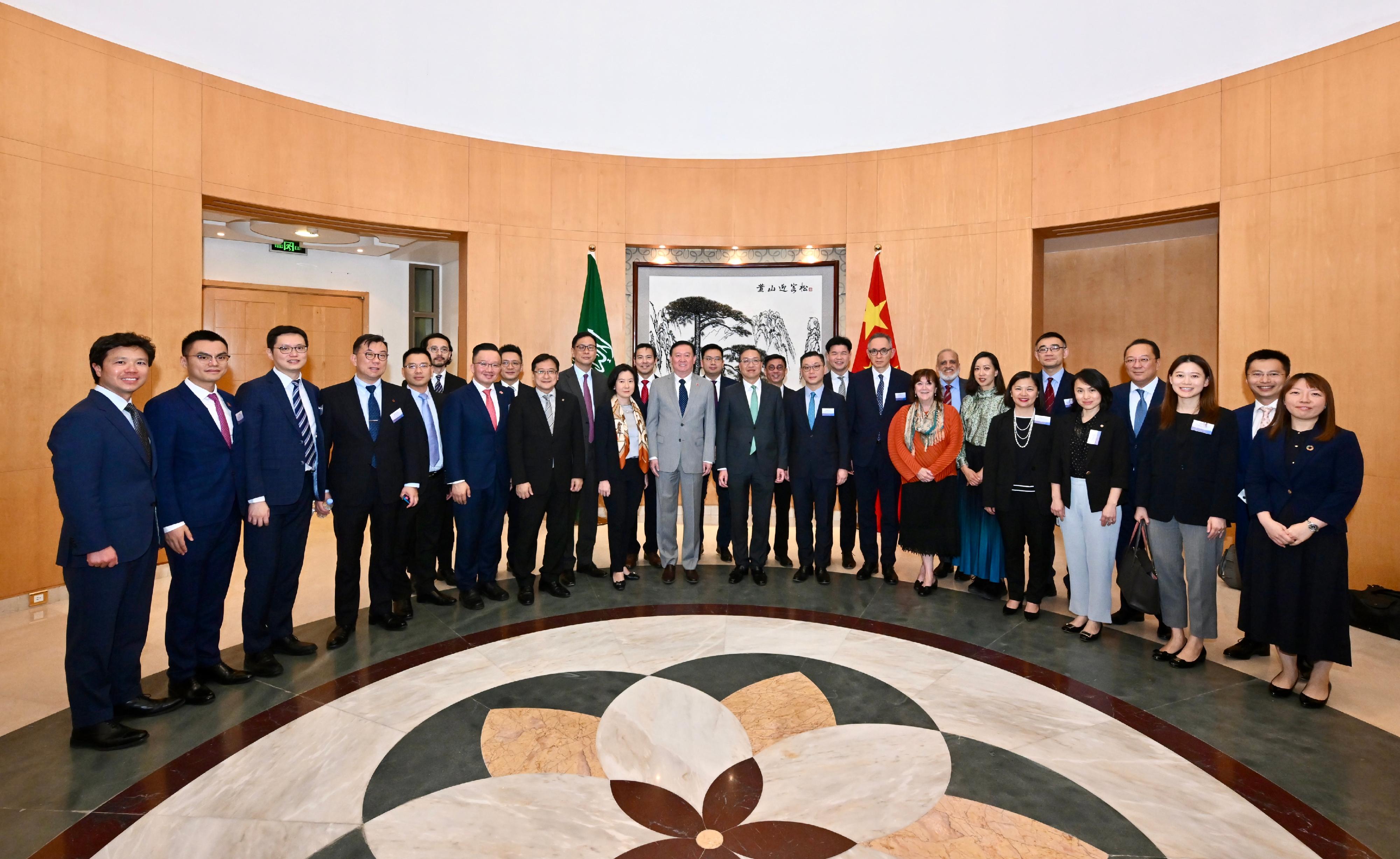 The Secretary for Justice, Mr Paul Lam, SC, arrived in Riyadh, Saudi Arabia, on May 19 (Riyadh time) with his about 30-person delegation, comprising representatives from the Law Society of Hong Kong, the Hong Kong Bar Association, the Hong Kong Exchanges and Clearing Limited, Invest Hong Kong and related sectors, and began a two-day visit to the city. Photo shows Mr Lam (centre) and his delegation with the Ambassador Extraordinary and Plenipotentiary of the People's Republic of China to the Kingdom of Saudi Arabia, Mr Chang Hua (13th left).
