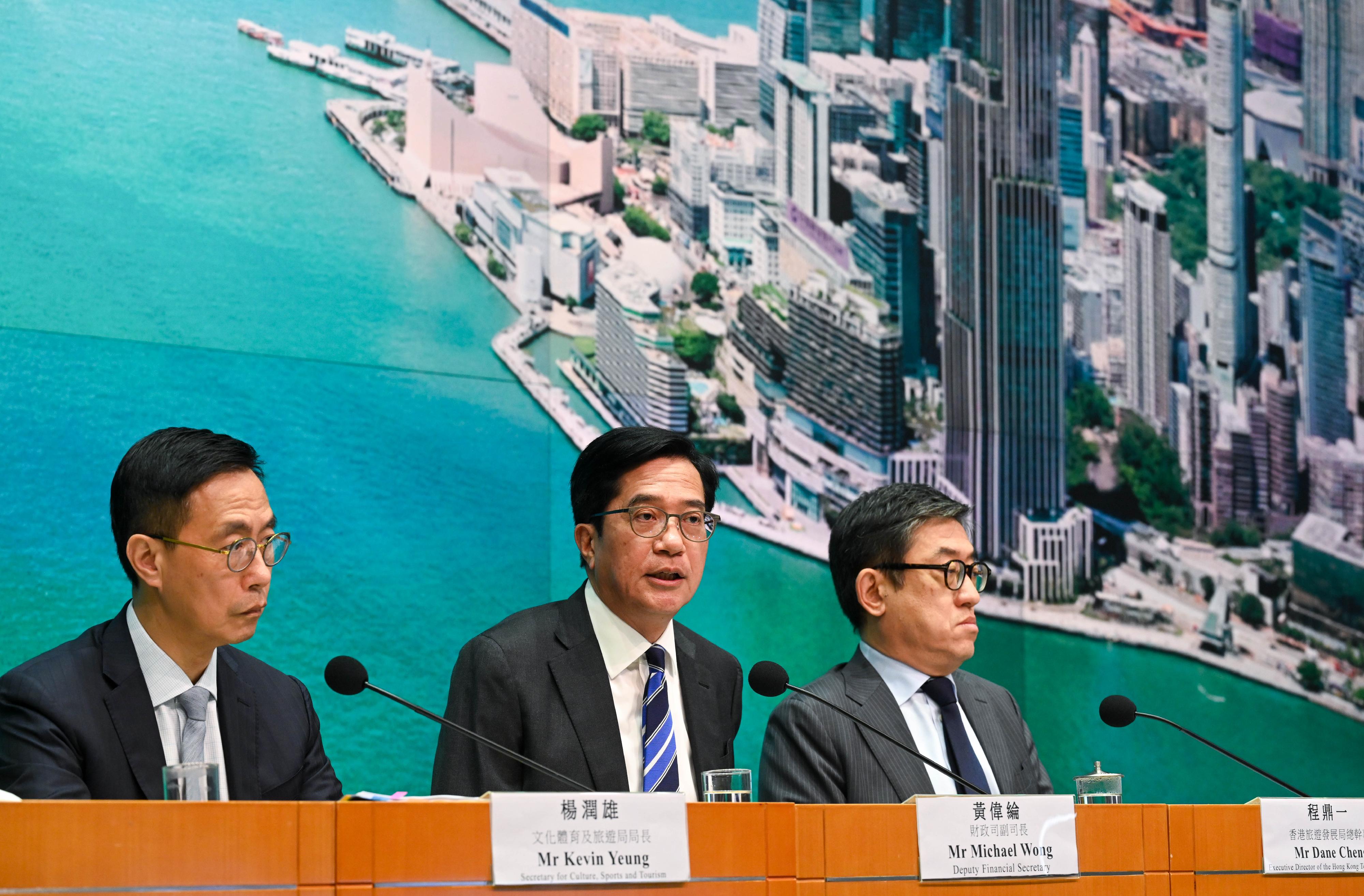 The Deputy Financial Secretary, Mr Michael Wong (centre), is joined by the Secretary for Culture, Sports and Tourism, Mr Kevin Yeung (left), and the Executive Director of the Hong Kong Tourism Board, Mr Dane Cheng (right), at a press conference today (May 21) to announce the calendar of mega events in Hong Kong (second half of 2024).
