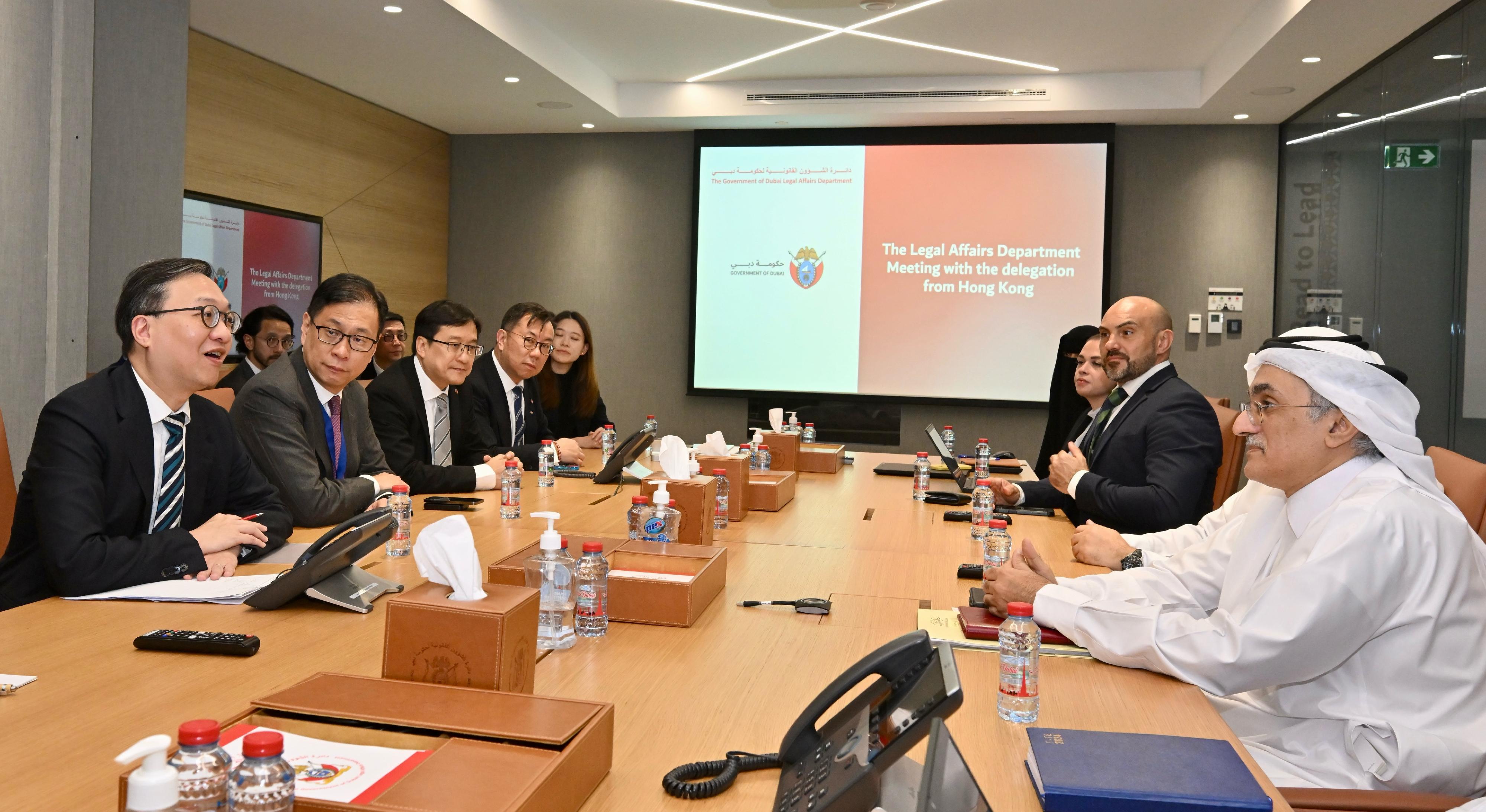The Secretary for Justice, Mr Paul Lam, SC, continued his visit to Dubai, the United Arab Emirates, today (May 22, Dubai time). Photo shows Mr Lam (first left) and his delegation meeting with the Director General of the Government of Dubai Legal Affairs Department,  Dr Lowai Mohamed Khalfan Belhoul (first right), and other senior representatives.
