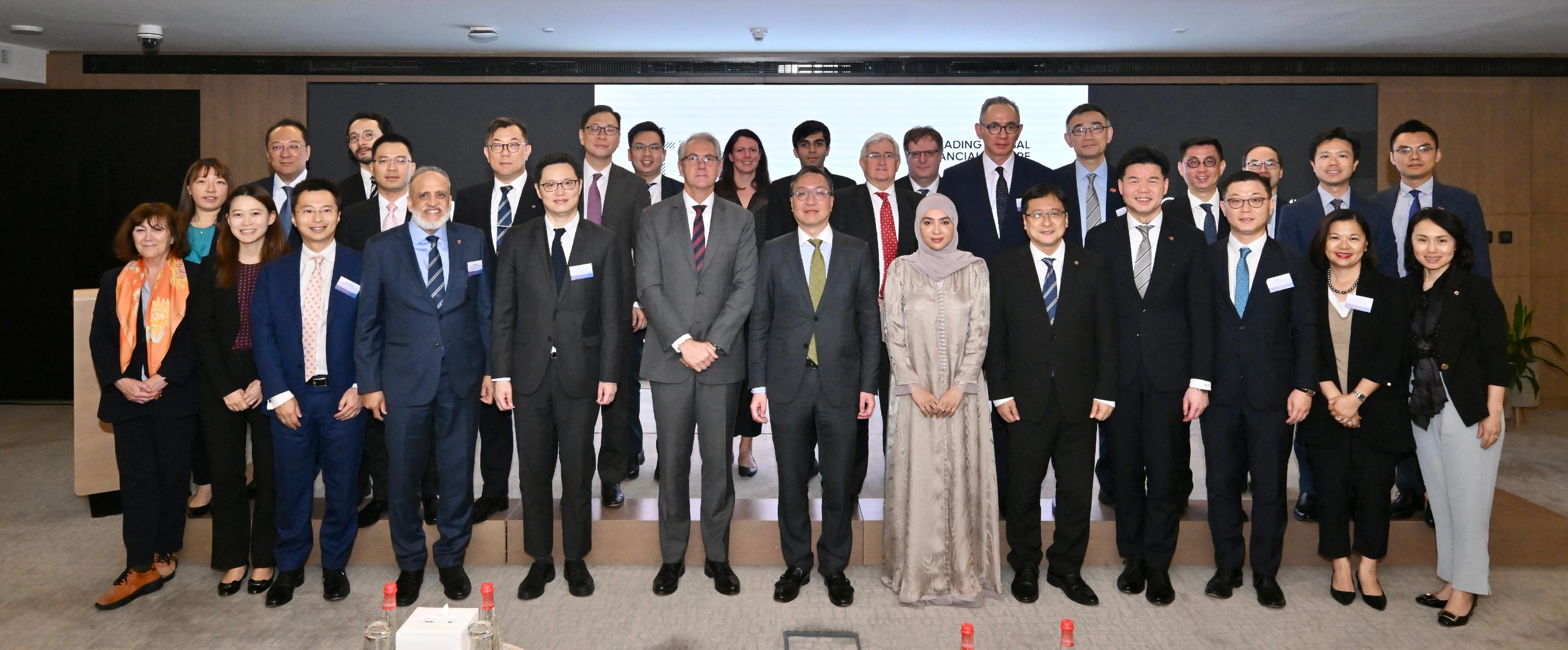 The Secretary for Justice, Mr Paul Lam, SC, concluded his visit to Middle East in Dubai, the United Arab Emirates, today (May 23, Dubai time). Photo shows Mr Lam (front row, centre), the Chief Legal Officer of Dubai International Financial Centre Authority, Mr Jacques Visser (front row, sixth left) and the delegation. 
