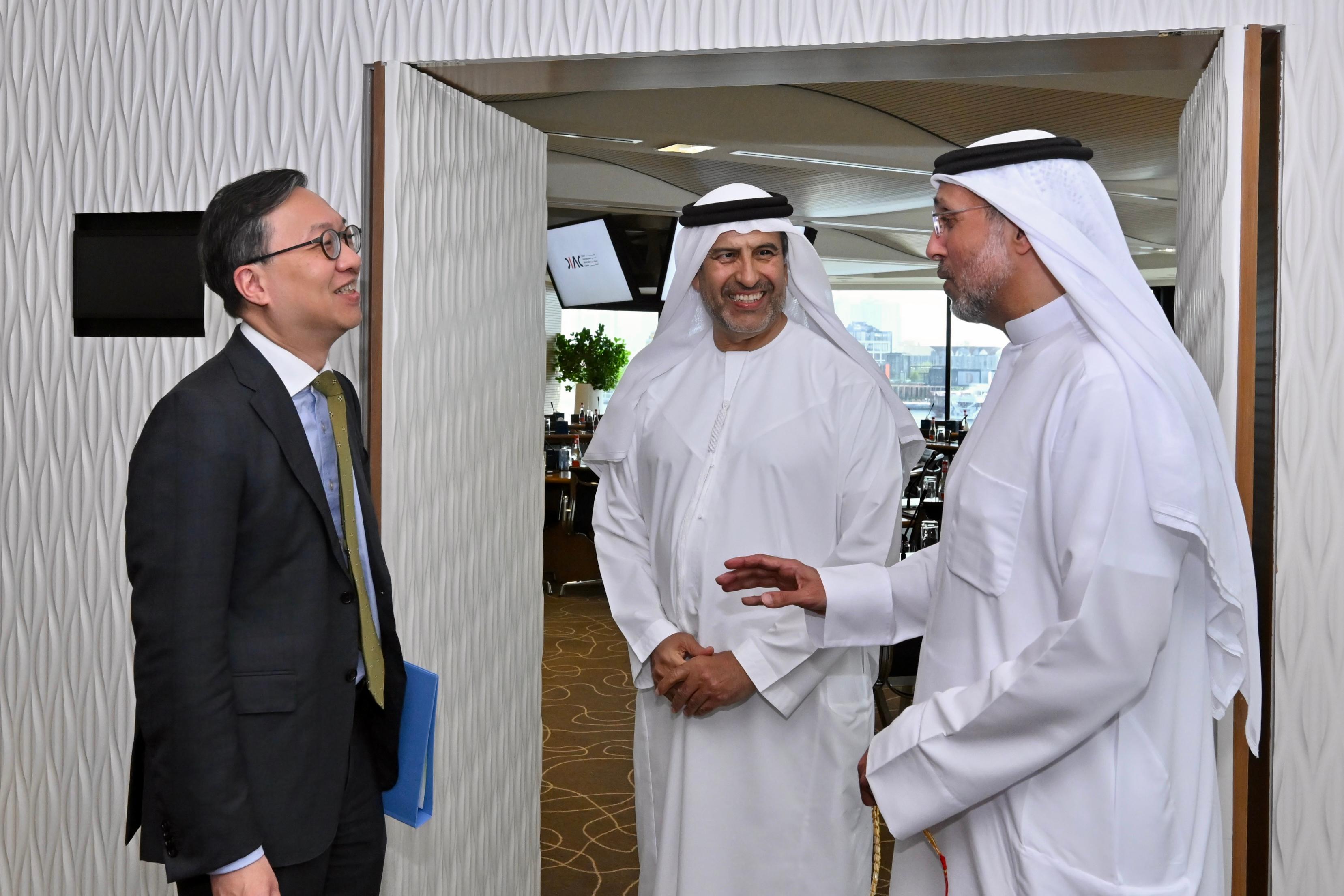 The Secretary for Justice, Mr Paul Lam, SC, concluded his visit to Middle East in Dubai, the United Arab Emirates, today (May 23, Dubai time). Photo shows Mr Lam (left) exchanging views with the Chairman of the Board of Dubai International Arbitration Centre, Dr Tariq Humaid Al Tayer (centre).
