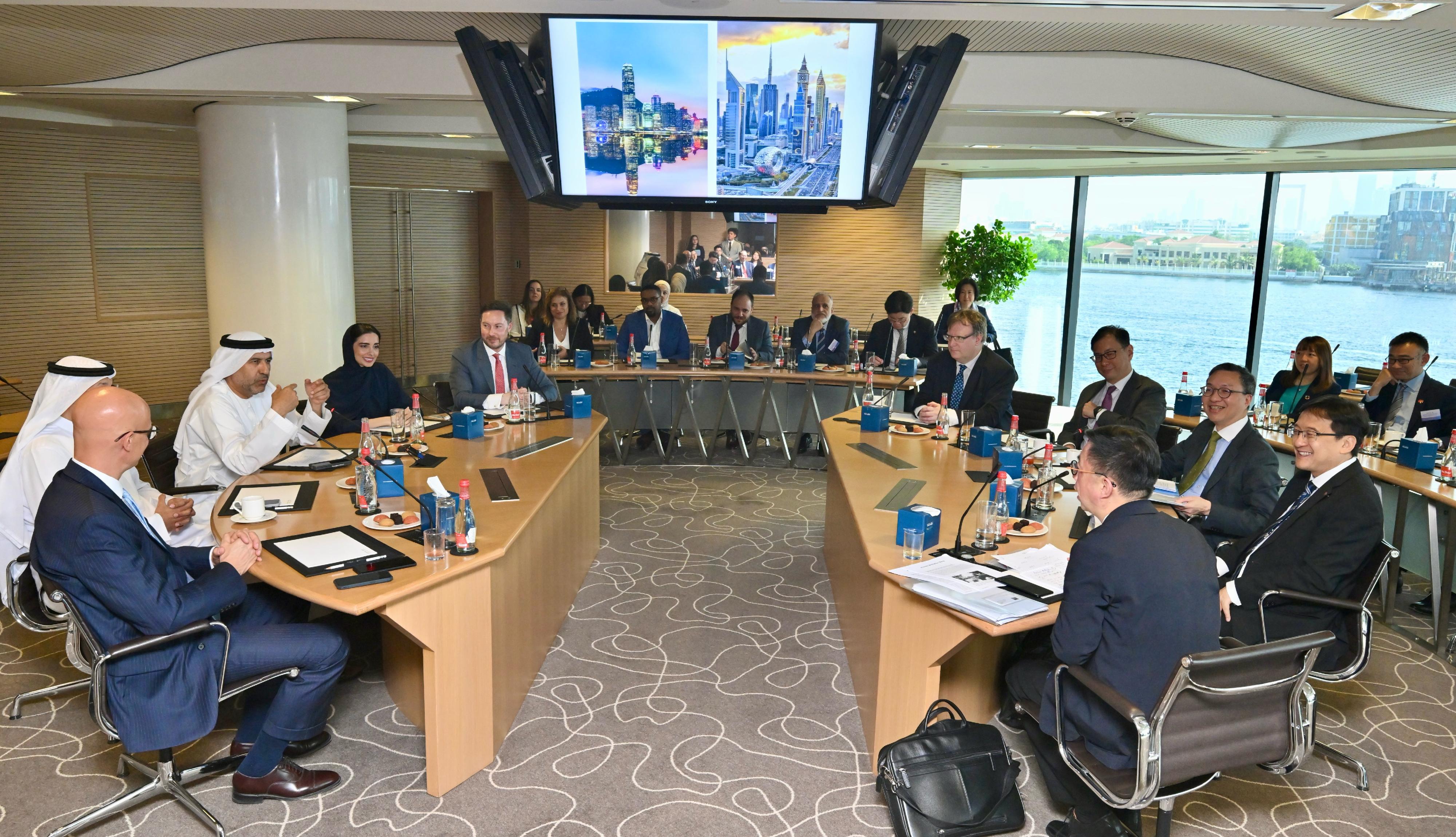 The Secretary for Justice, Mr Paul Lam, SC, concluded his visit to Middle East in Dubai, the United Arab Emirates, today (May 23, Dubai time). Photo shows Mr Lam (front row, third right) and his delegation meeting with the Chairman of the Board of Dubai International Arbitration Centre, Dr Tariq Humaid Al Tayer (front row, third left) and senior representatives of the Centre.
