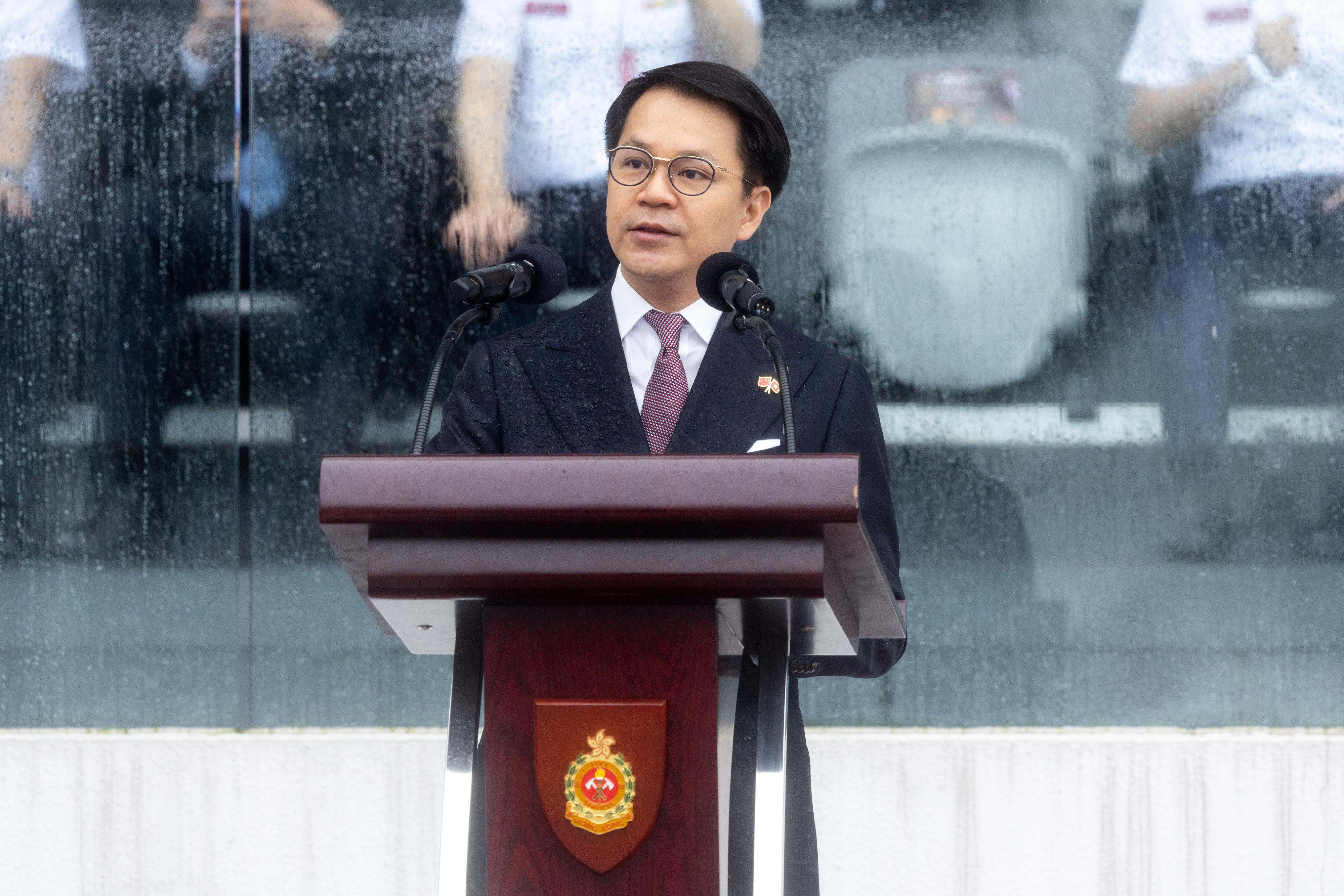 The Chairman of the Legislative Council Panel on Security, Mr Chan Hak-kan, reviewed the Fire Services passing-out parade at the Fire and Ambulance Services Academy today (May 24). Photo shows Mr Chan delivering a speech at the ceremony.