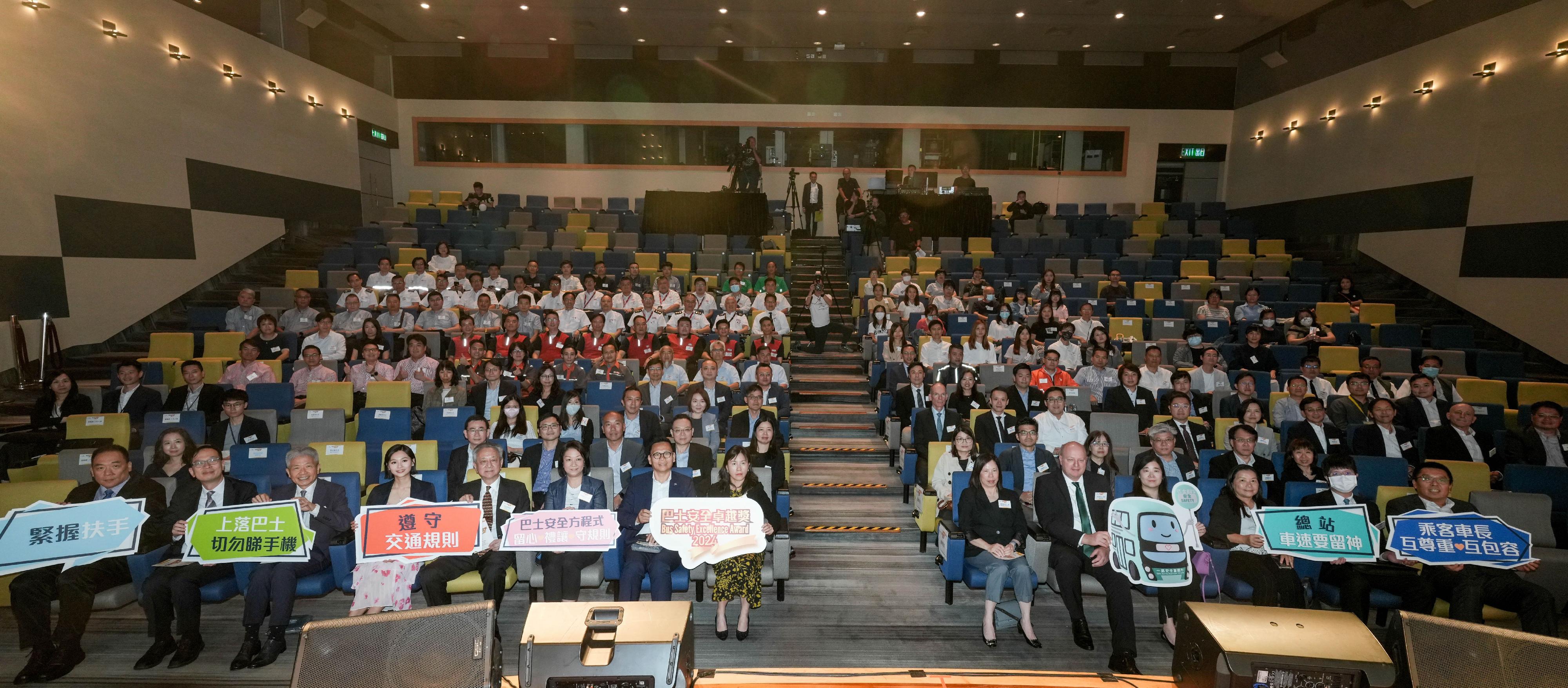 The Transport Department (TD) today (May 24) held the Bus Safety Excellence Award Ceremony 2024 at the Hong Kong Convention and Exhibition Centre in Wan Chai. Photo shows the Permanent Secretary for Transport and Logistics, Ms Mable Chan (front row, eighth left); the Commissioner for Transport, Ms Angela Lee (front row, sixth left); the Deputy Commissioner for Transport (Transport Services and Management), Ms Macella Lee (front row, sixth right); the Acting Deputy Commissioner for Transport (Planning and Technical Services), Mr Leung Sai-ho (front row, second left); the Chairman of the Transport Advisory Committee, Professor Stephen Cheung (front row, third left); the Chairman of the Legislative Council Panel on Transport, Mr Chan Han-pan (front row, seventh left); Member of the Legislative Council for the Transport Functional Constituency Mr Frankie Yick (front row, fifth left); and the Chief Superintendent of Police (Traffic) of the Hong Kong Police Force, Mr Chan Siu-ming (front row, first left), with representatives from the TD and franchised bus companies, awardees and guests.