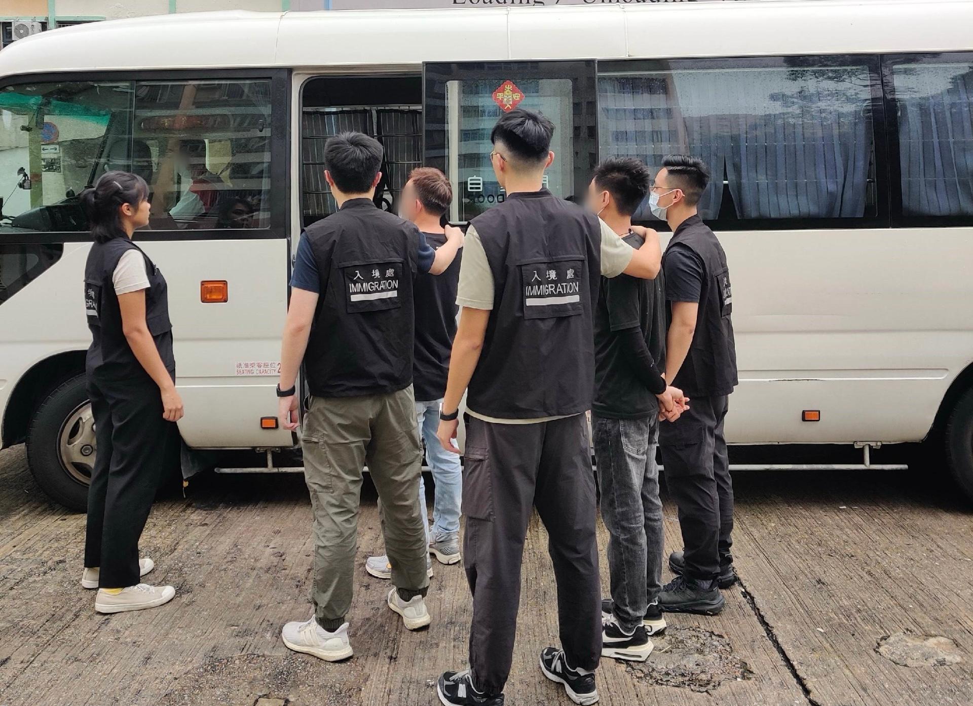 The Immigration Department mounted a series of territory-wide anti-illegal worker operations and joint operations with the Hong Kong Police Force codenamed "Champion" and "Windsand" for four consecutive days from May 20 to yesterday (May 23). Photo shows suspected illegal workers arrested during an operation.
