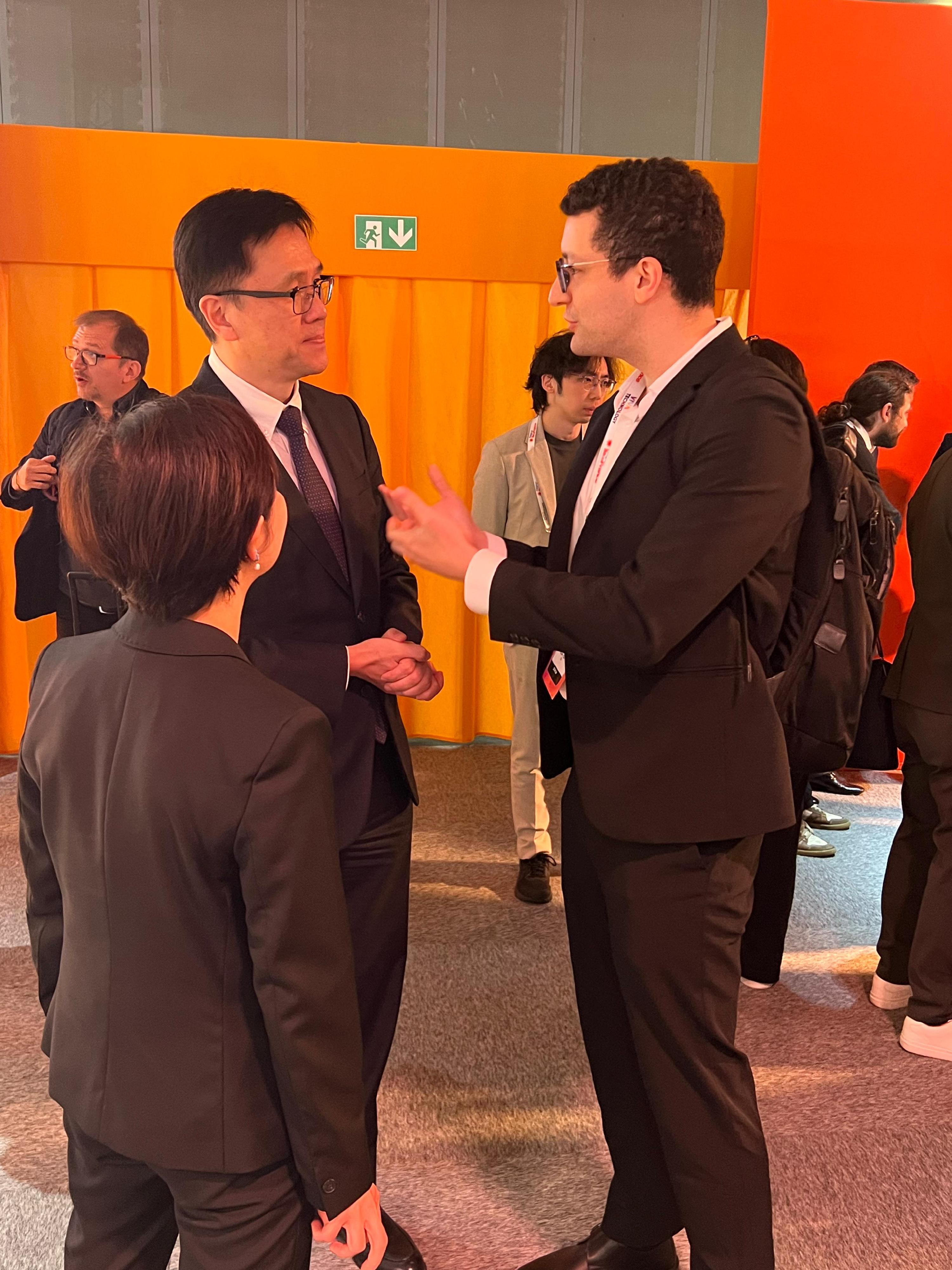 The Secretary for Innovation, Technology and Industry, Professor Sun Dong (left), attended a networking reception hosted by the Hong Kong Trade Development Council during VivaTech 2024 in Paris, France on May 24 (Paris time) to exchange views on the development and collaboration of innovation and technology (I&T) with local leaders of the I&T industry, entrepreneurs, influencers and investors.