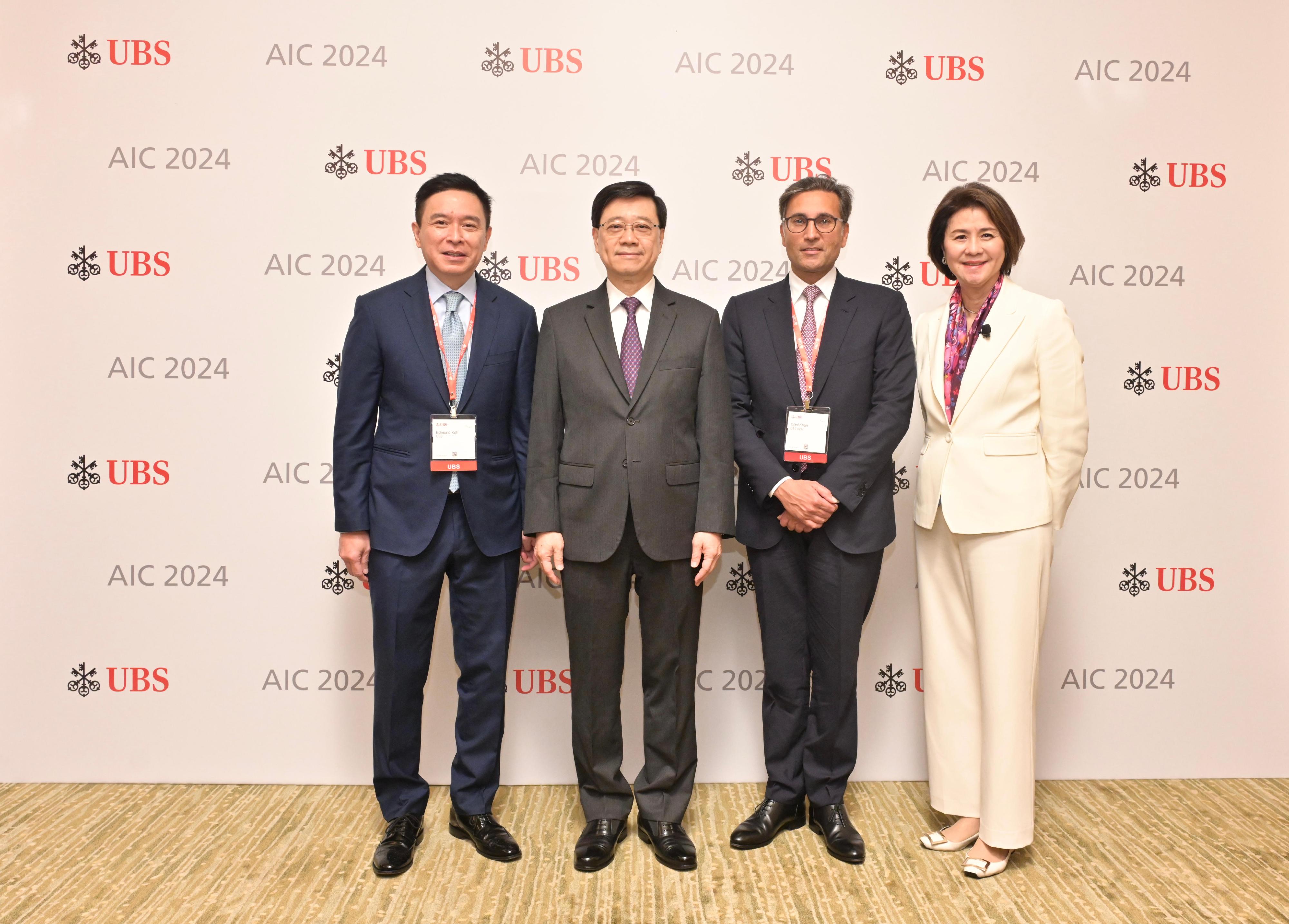 The Chief Executive, Mr John Lee, attended the UBS Asian Investment Conference 2024 today (May 28). Photo shows (from left) the President of UBS Asia Pacific, Mr Edmund Koh; Mr Lee; the President of UBS Global Wealth Management, Mr Iqbal Khan; and the Chairman of UBS Global Wealth Management Asia and Head and Chief Executive, UBS Hong Kong, Ms Amy Lo, at the conference.
