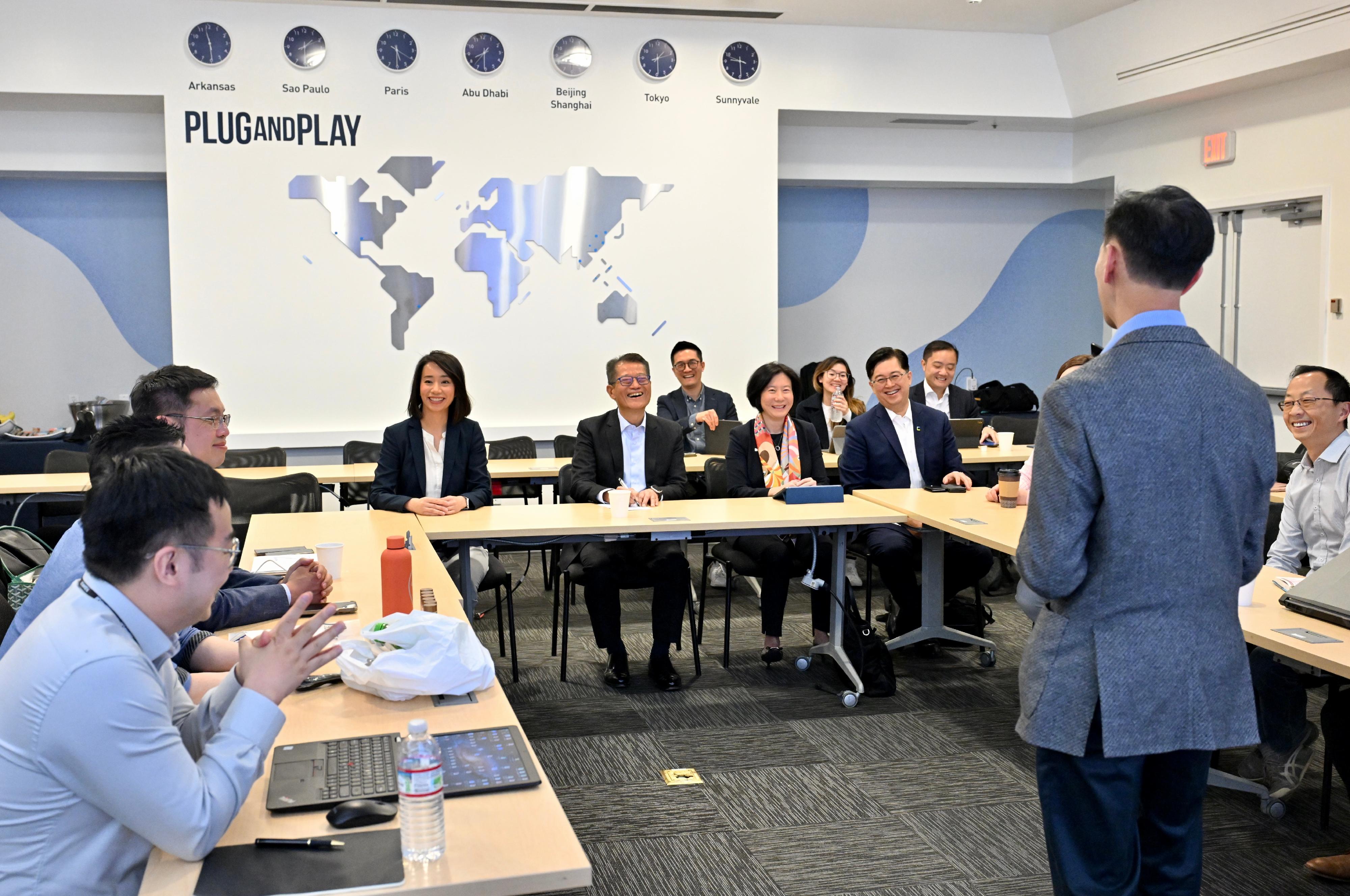 The Financial Secretary, Mr Paul Chan, began his visit to the United States on May 28 (San Francisco time), and visited a Silicon Valley startup accelerator, Plug and Play. Photo shows Mr Chan (fifth left) interacting with five start-ups from Hong Kong Science Park who are being trained in the Silicon Valley with the support of the company. 
