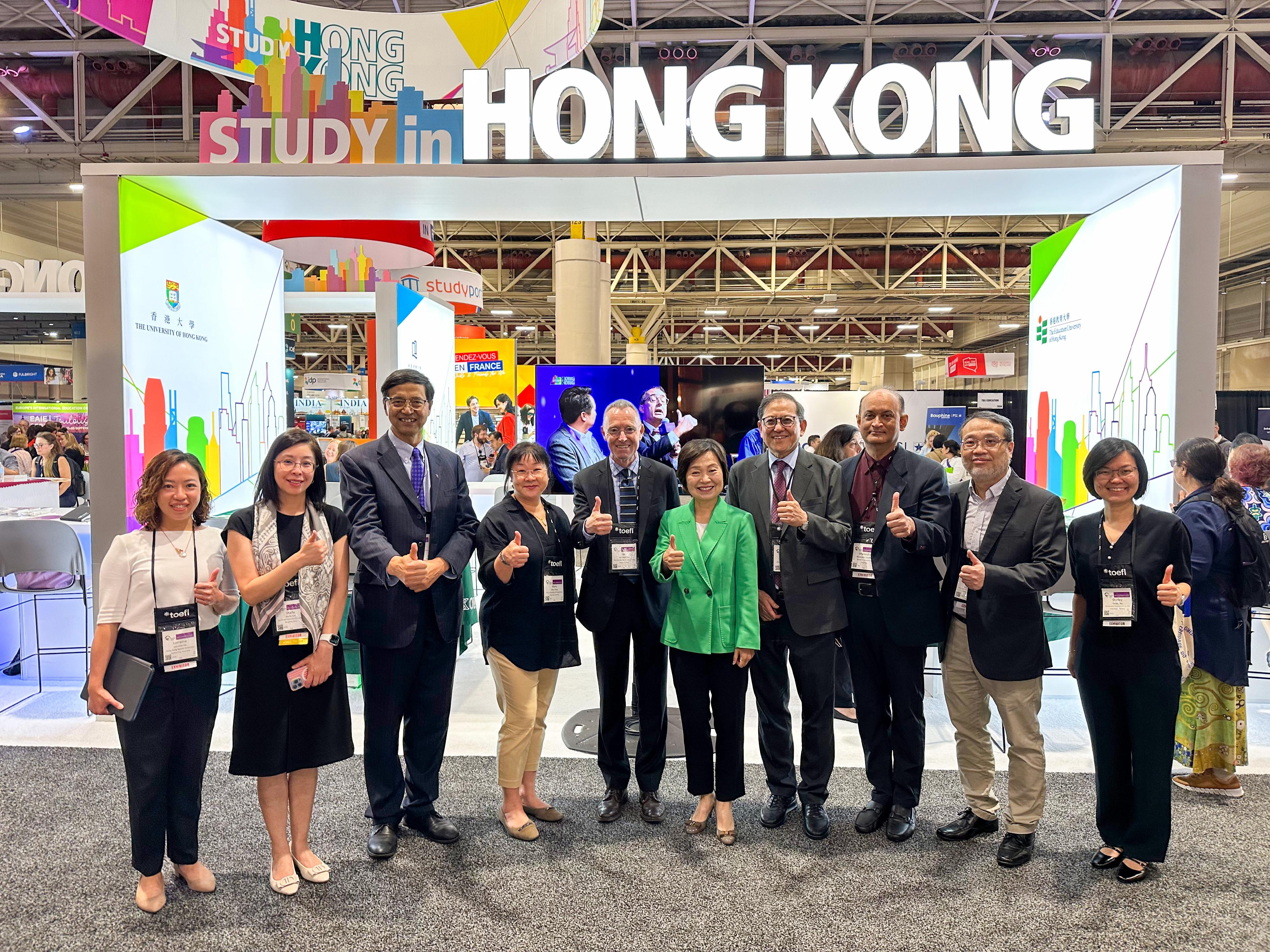 The Secretary for Education, Dr Choi Yuk-lin, visited the Hong Kong Pavilion set up by the Heads of Universities Committee Standing Committee on Internationalisation and funded by the University Grants Committee (UGC) at the NAFSA Annual Conference & Expo in New Orleans, the United States, on May 29 (New Orleans time). Photo shows Dr Choi (fifth right) and the Secretary-General of the UGC, Professor James Tang (fourth right), with participating university representatives.