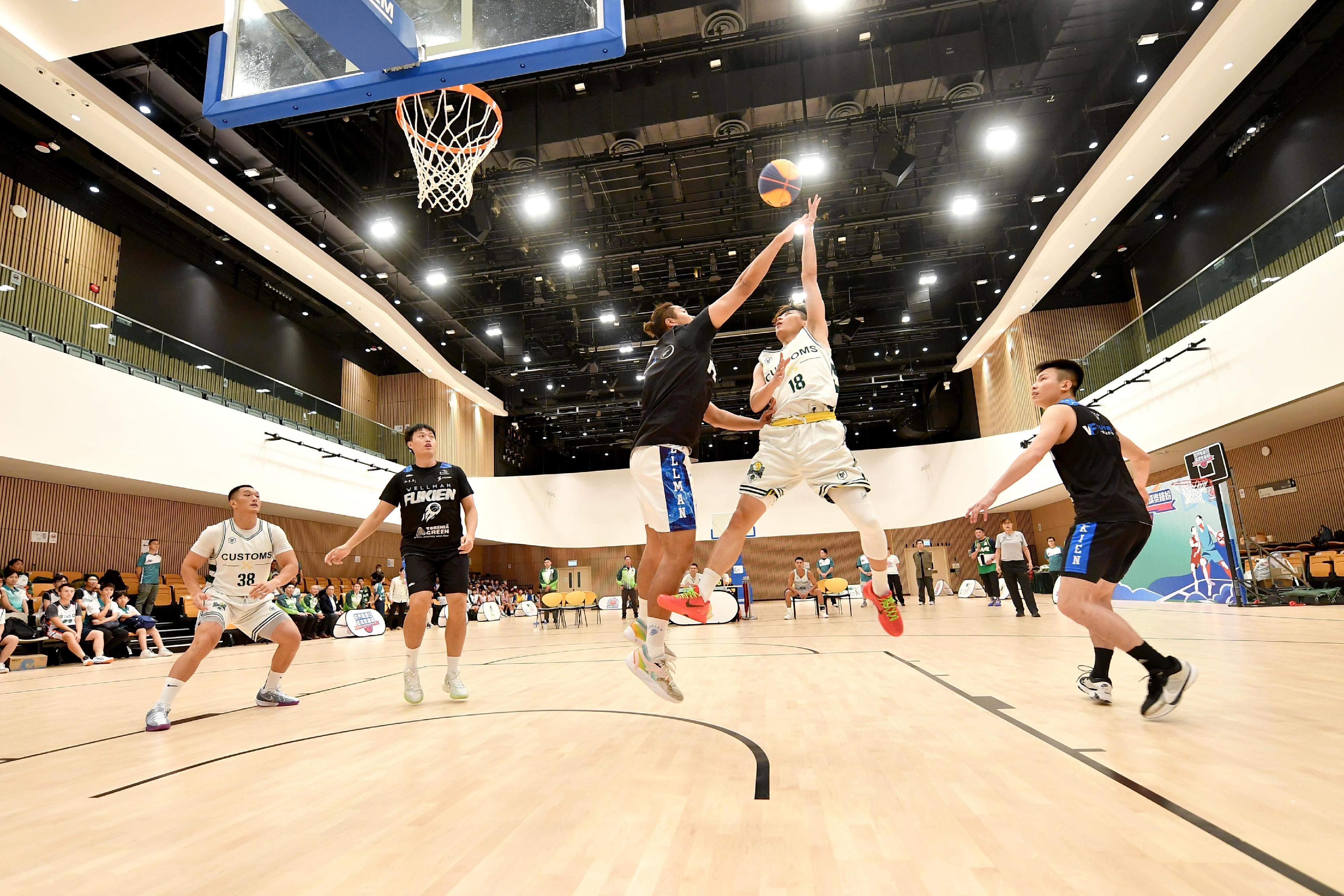 Today (May 31) marks the World No Tobacco Day. The Customs and Excise Department and the Hong Kong Youth Development Alliance jointly organised the "World No Tobacco Day Basketball Carnival" event today to promote the smoke-free lifestyle among youth and students in Hong Kong. Photo shows participants in a 3X3 basketball match.