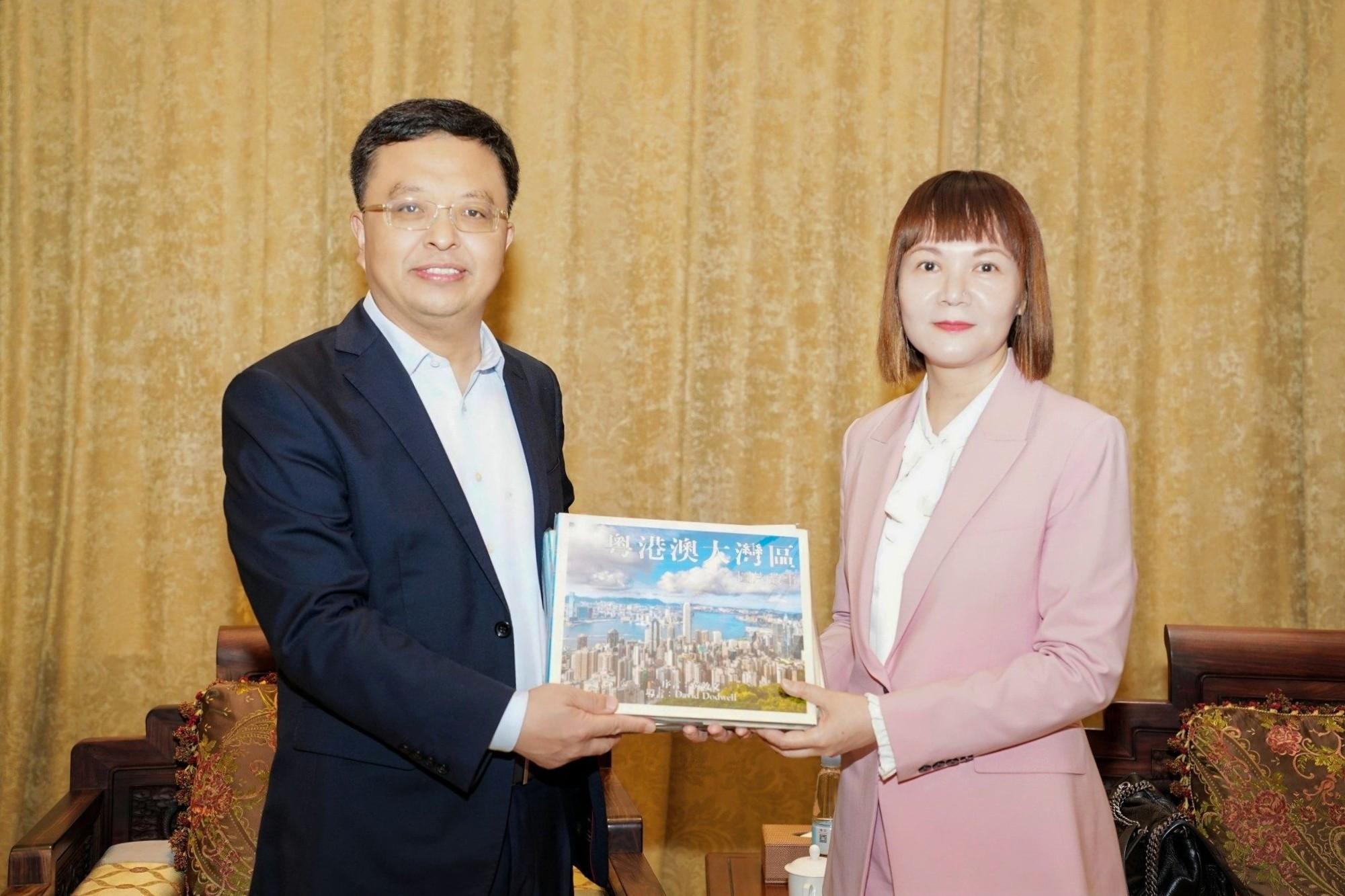 The Commissioner for the Development of the Guangdong-Hong Kong-Macao Greater Bay Area, Ms Maisie Chan (right), meets with member of the Standing Committee of the Communist Party of China Zhongshan Municipal Committee and Vice Mayor of Zhongshan, Mr Ye Hongguang (left), during her visit to Zhongshan today (June 3).  