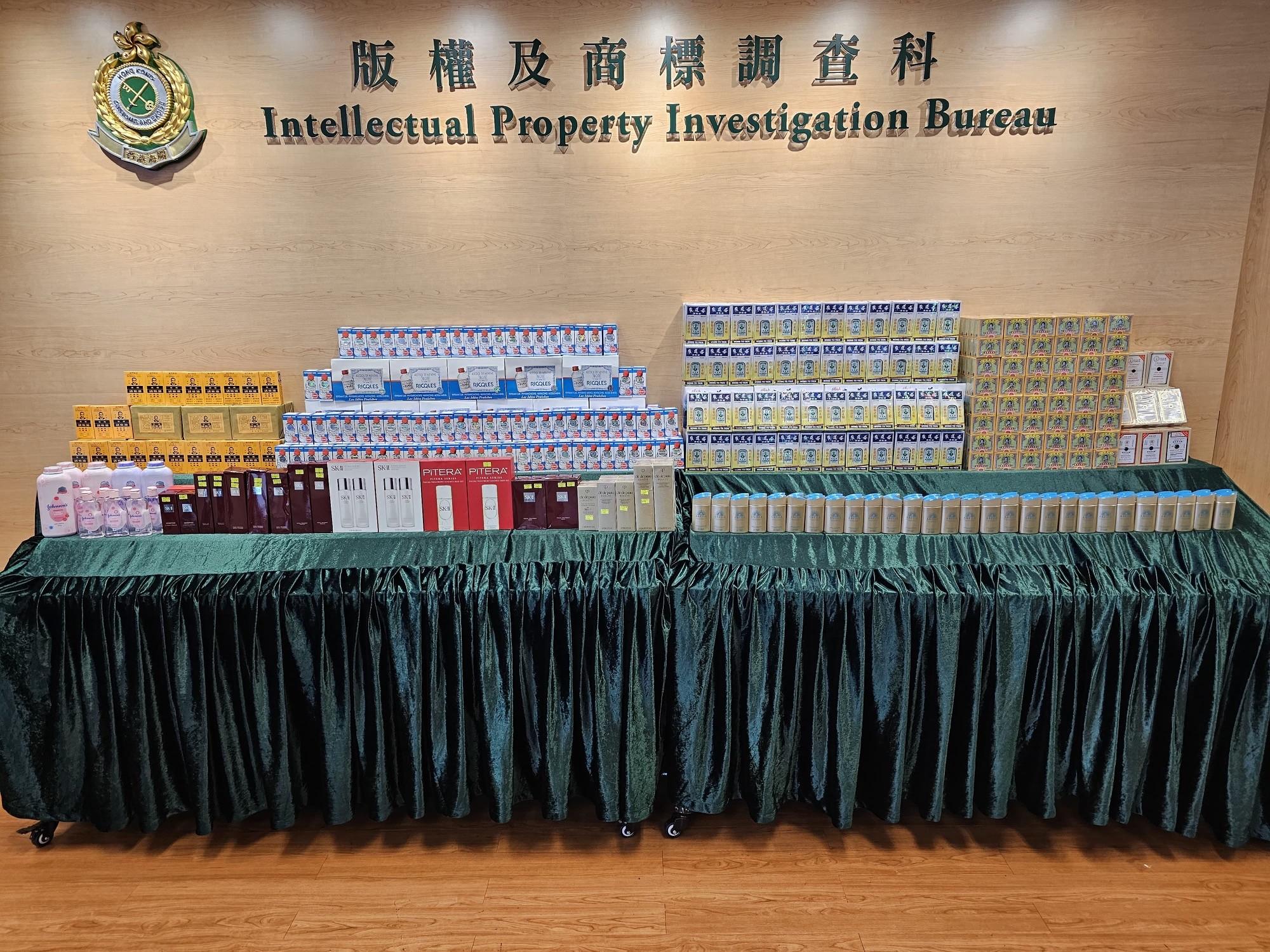 Hong Kong Customs conducted a special operation in Mong Kok and Fo Tan yesterday (June 4) to combat the sale of counterfeit goods and seized about 5 000 items of suspected counterfeit goods, including medicines and cosmetics, with an estimated market value of about $620,000. Photo shows some of the suspected counterfeit goods seized.