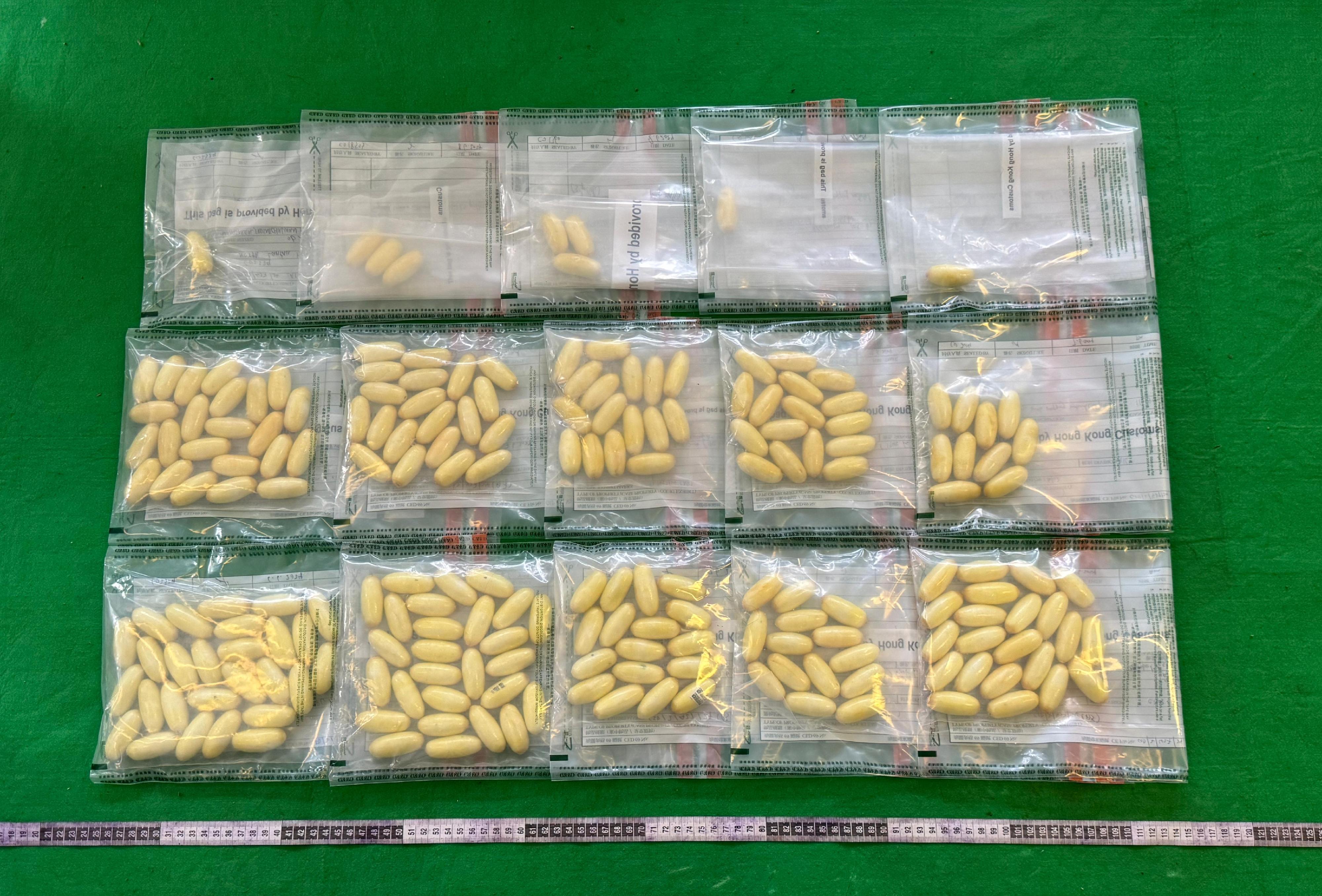 Hong Kong Customs detected a dangerous drugs internal concealment case involving two incoming passengers at Hong Kong International Airport and seized about 2.2 kilogram of suspected cocaine with an estimated market value of about $2 million on June 6. Photo shows the suspected cocaine seized.