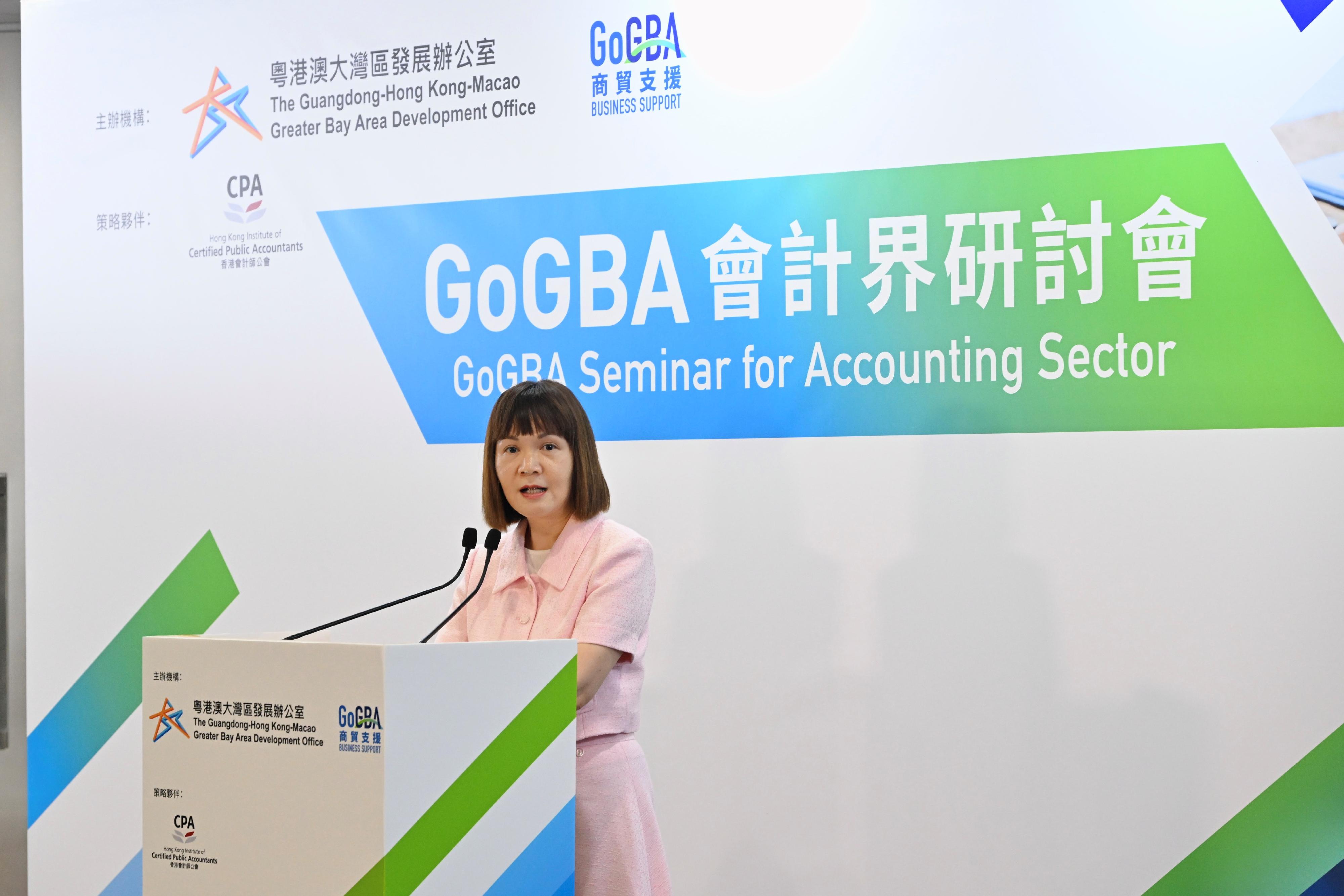 The Commissioner for the Development of the Guangdong-Hong Kong-Macao Greater Bay Area, Ms Maisie Chan, delivers a speech at the GoGBA Seminar for Accounting Sector today (June 14).