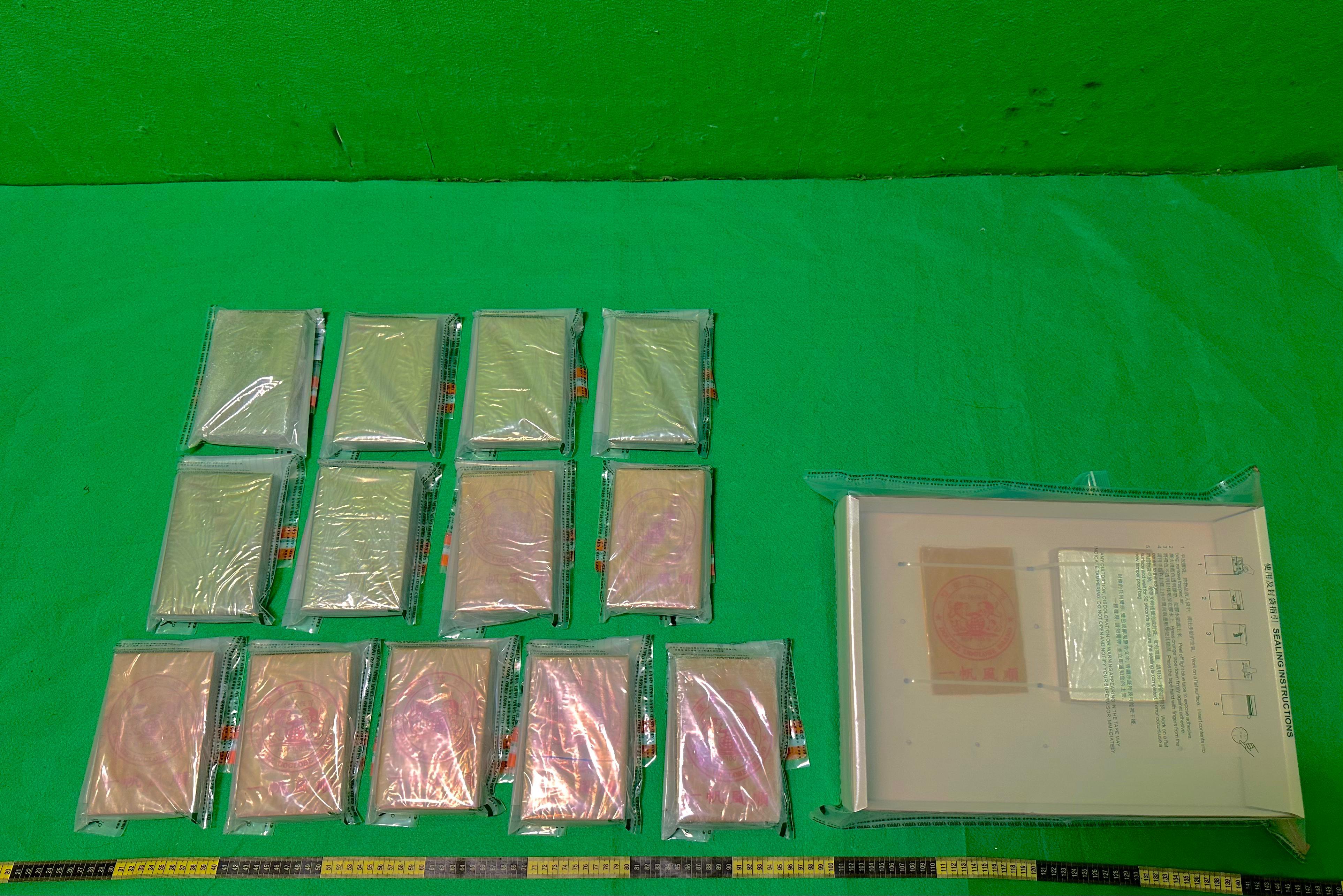 Hong Kong Customs yesterday (June 16) detected two passenger drug trafficking cases at Hong Kong International Airport and seized about 5.3 kilograms of suspected heroin and about 2.1kg of suspected cannabis buds with a total estimated market value of about $5 million. Photo shows the suspected heroin seized in the second case.
