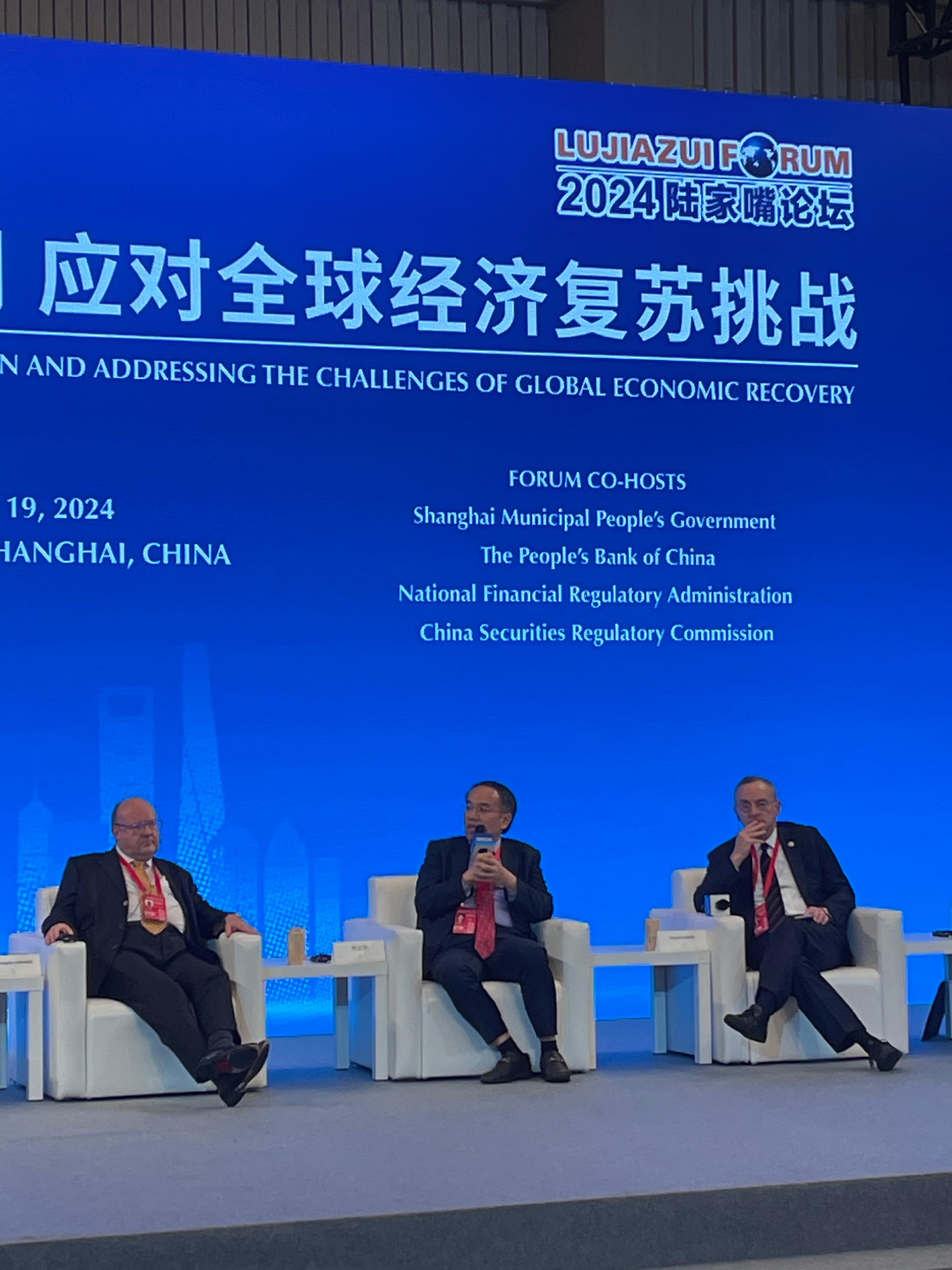 The Secretary for Financial Services and the Treasury, Mr Christopher Hui, attended the 2024 Lujiazui Forum in Shanghai today (June 19). Photo shows Mr Hui (centre) addressing the second plenary session "Strengthening International Monetary Policy Coordination and Addressing the Challenges of Global Economic Recovery".
