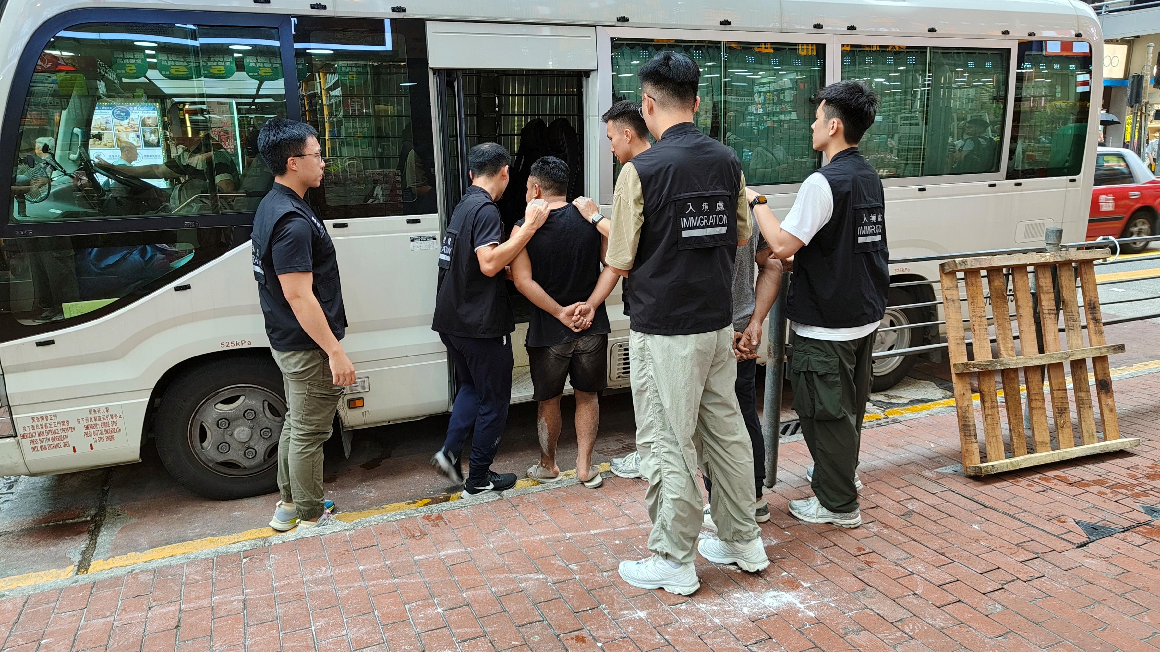 The Immigration Department mounted a series of territory-wide anti-illegal worker operations codenamed "Contribute" and "Twilight", and joint operations with the Hong Kong Police Force codenamed "Champion", "Powerplayer" and "Windsand" for four consecutive days from June 17 to yesterday (June 20). Photo shows suspected illegal workers arrested during an operation.