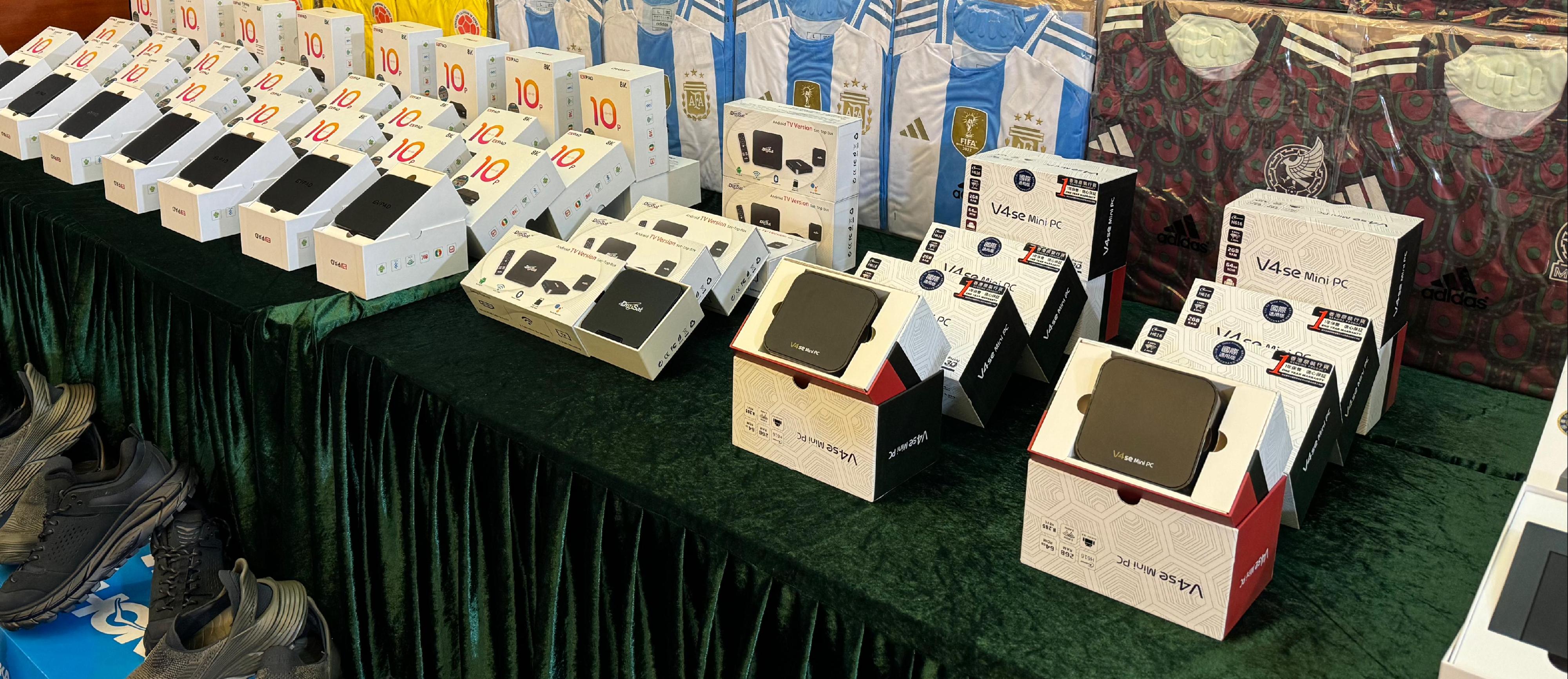 As a number of international sports events will be held consecutively starting this month, Hong Kong Customs conducted a three-week special operation from June 3 to 23 by adopting a three-pronged strategy combining enforcement, inspection and public education to protect intellectual property rights. Photo shows some of the suspected illicit streaming devices seized.