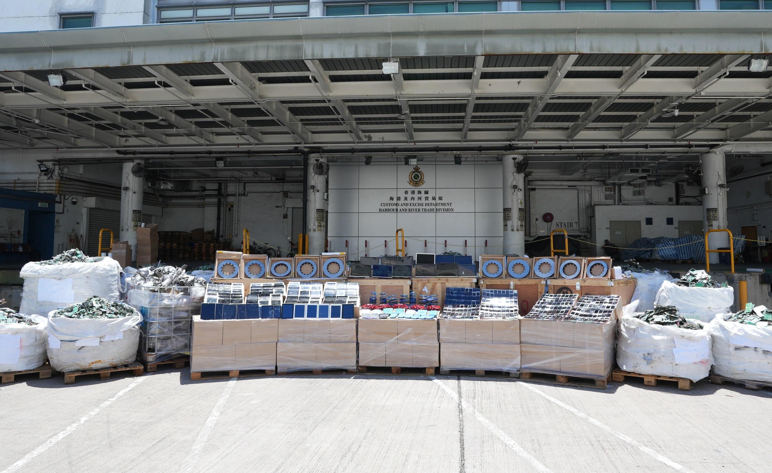 Hong Kong Customs mounted a special operation codenamed "Big Wave" in June and detected three suspected smuggling cases involving ocean-going vessels. A large batch of suspected smuggled goods with a total estimated market value of about $100 million was seized. Photo shows the suspected smuggled goods seized.