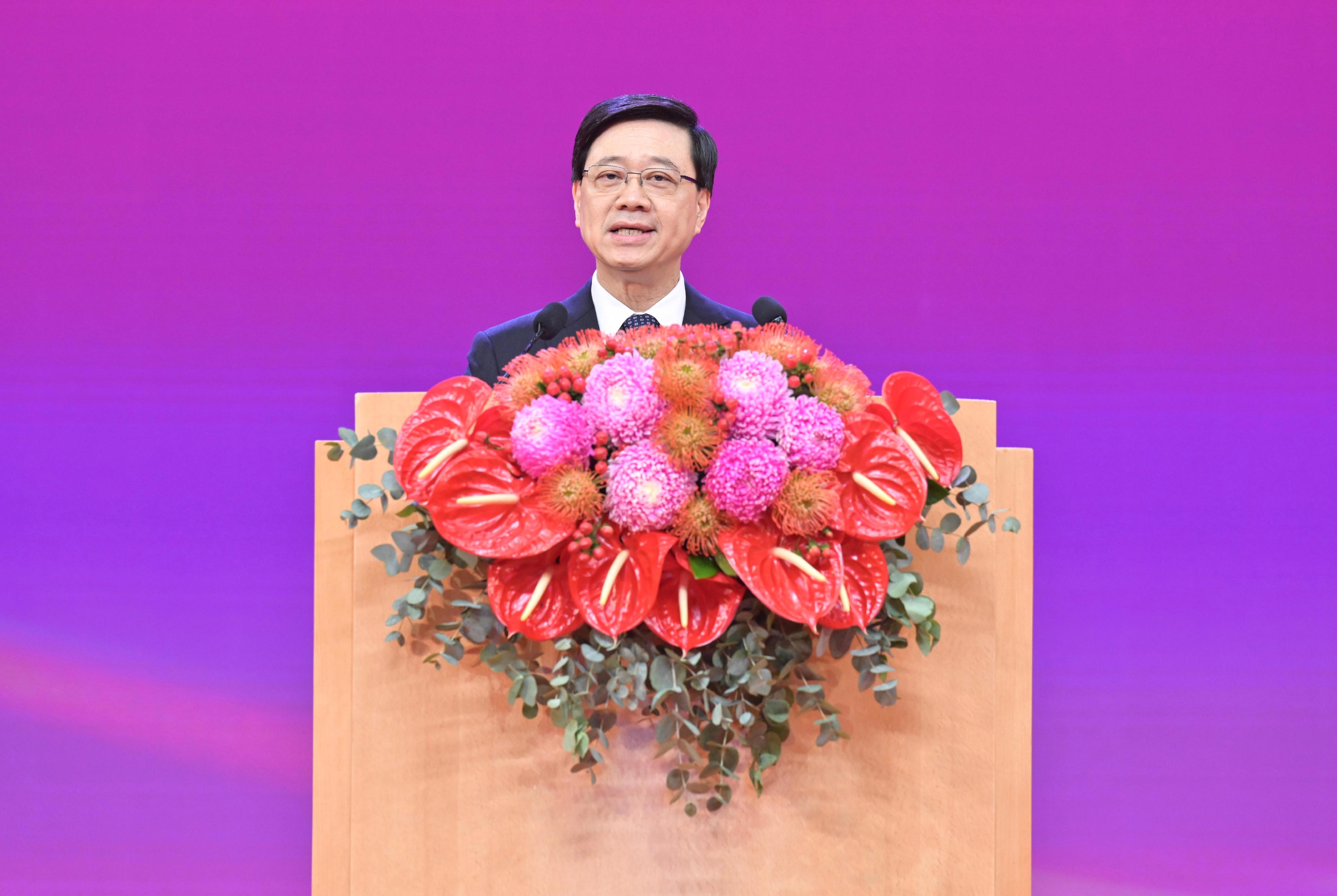 The Chief Executive, Mr John Lee, together with Principal Officials and guests, attended the reception for the 27th anniversary of the establishment of the Hong Kong Special Administrative Region at the Hong Kong Convention and Exhibition Centre this morning (July 1). Photo shows Mr Lee addressing the reception.