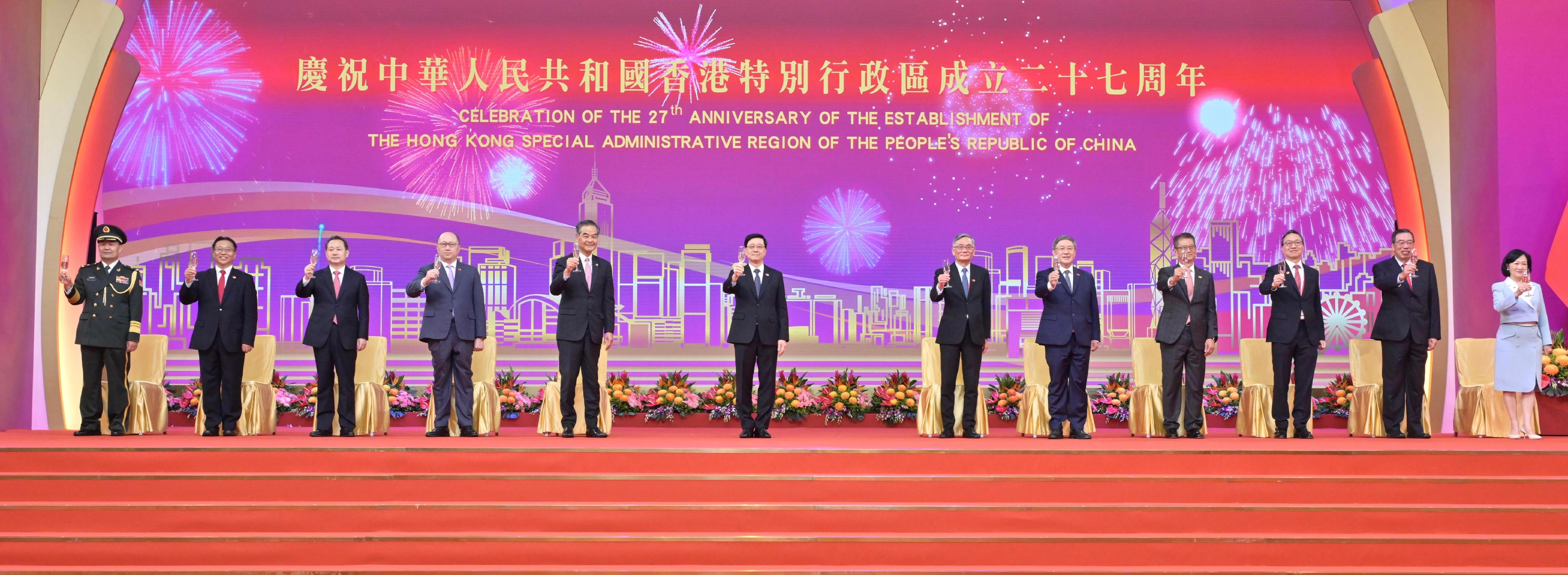 The Chief Executive, Mr John Lee, together with Principal Officials and guests, attended the reception for the 27th anniversary of the establishment of the Hong Kong Special Administrative Region (HKSAR) at the Hong Kong Convention and Exhibition Centre this morning (July 1). Photo shows (from left) the Commander-in-chief of the Chinese People's Liberation Army Hong Kong Garrison, Major General Peng Jingtang; the Commissioner of the Ministry of Foreign Affairs in the HKSAR, Mr Cui Jianchun; the Head of the Office for Safeguarding National Security of the Central People's Government in the HKSAR, Mr Dong Jingwei; the Director of the Liaison Office of the Central People's Government in the HKSAR, Mr Zheng Yanxiong; Vice-Chairman of the National Committee of the Chinese People's Political Consultative Conference Mr C Y Leung; Mr Lee; the Chief Justice of the Court of Final Appeal, Mr Andrew Cheung Kui-nung; the Acting Chief Secretary for Administration, Mr Cheuk Wing-hing; the Financial Secretary, Mr Paul Chan; the Secretary for Justice, Mr Paul Lam, SC; the President of the Legislative Council, Mr Andrew Leung; and the Convenor of the Non-official Members of the Executive Council, Mrs Regina Ip, proposing a toast.