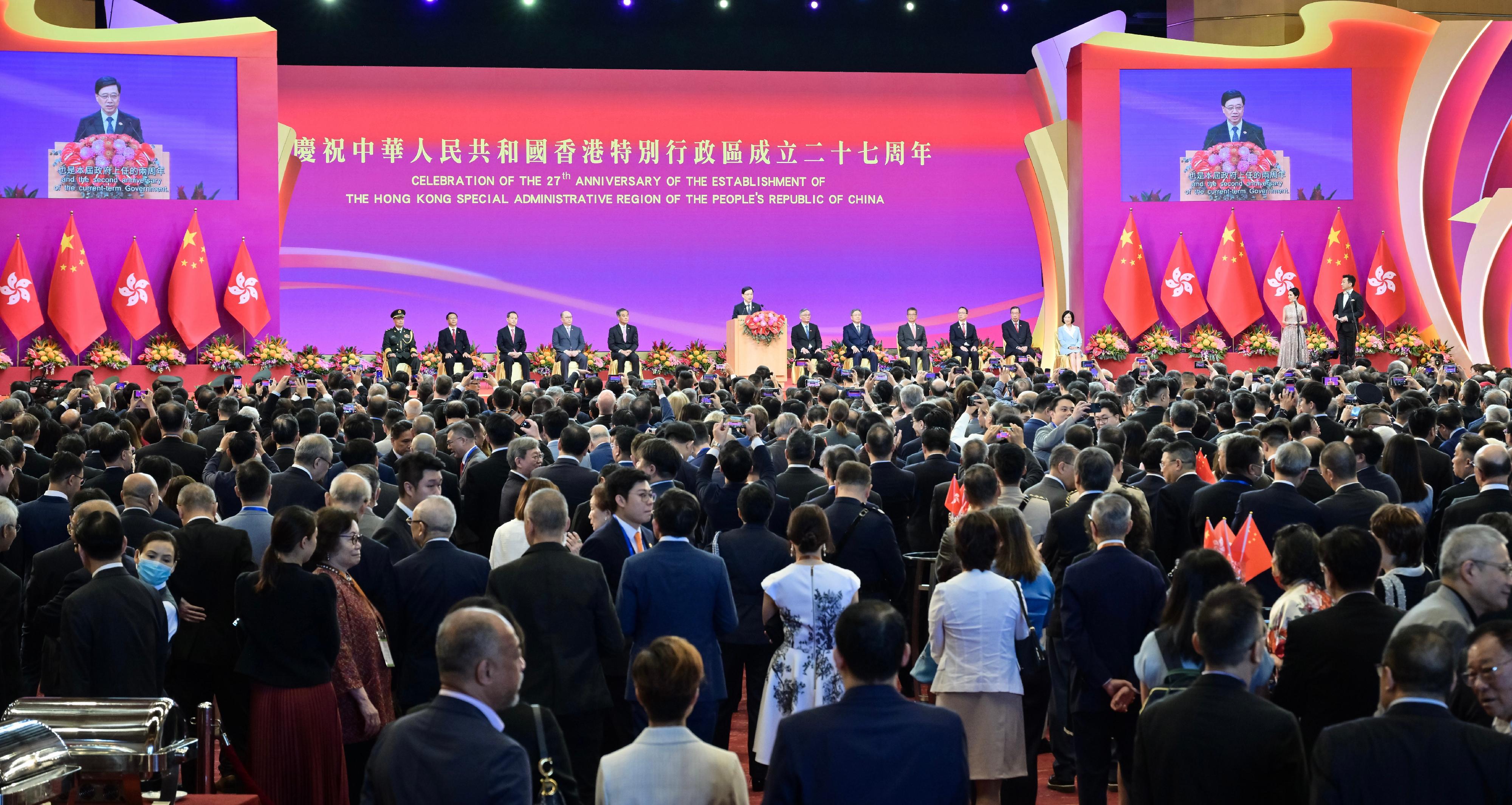 The Chief Executive, Mr John Lee, together with Principal Officials and guests, attends the reception for the 27th anniversary of the establishment of the Hong Kong Special Administrative Region at the Hong Kong Convention and Exhibition Centre this morning (July 1).