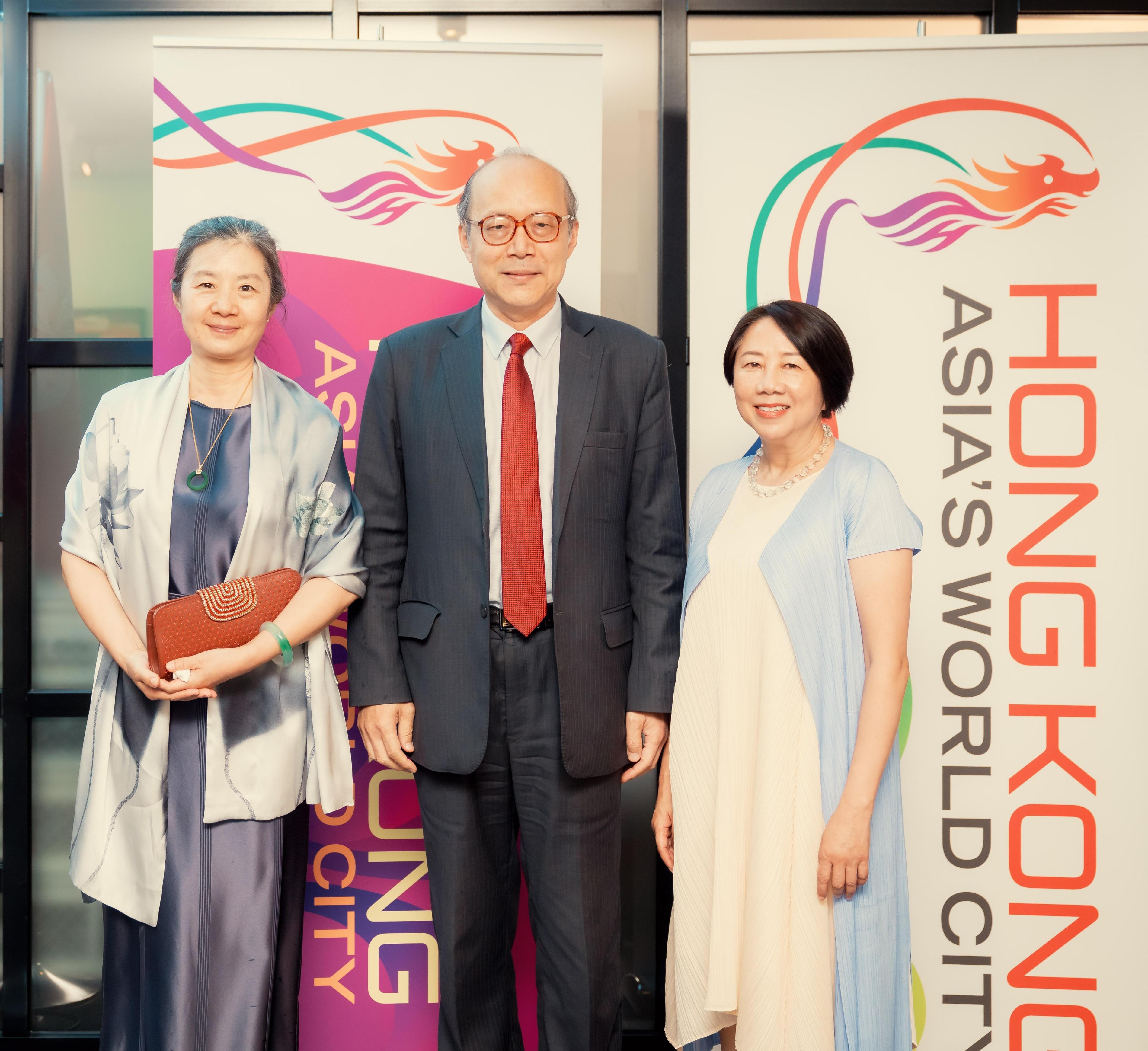 The Permanent Representative of the Hong Kong Special Administrative Region of China to the World Trade Organization, Miss Winky So (right), pictured at the reception with the Ambassador Extraordinary and Plenipotentiary, Permanent Representative of the People’s Republic of China to the United Nations Office at Geneva and other International Organizations in Switzerland, Mr Chen Xu, and his wife.