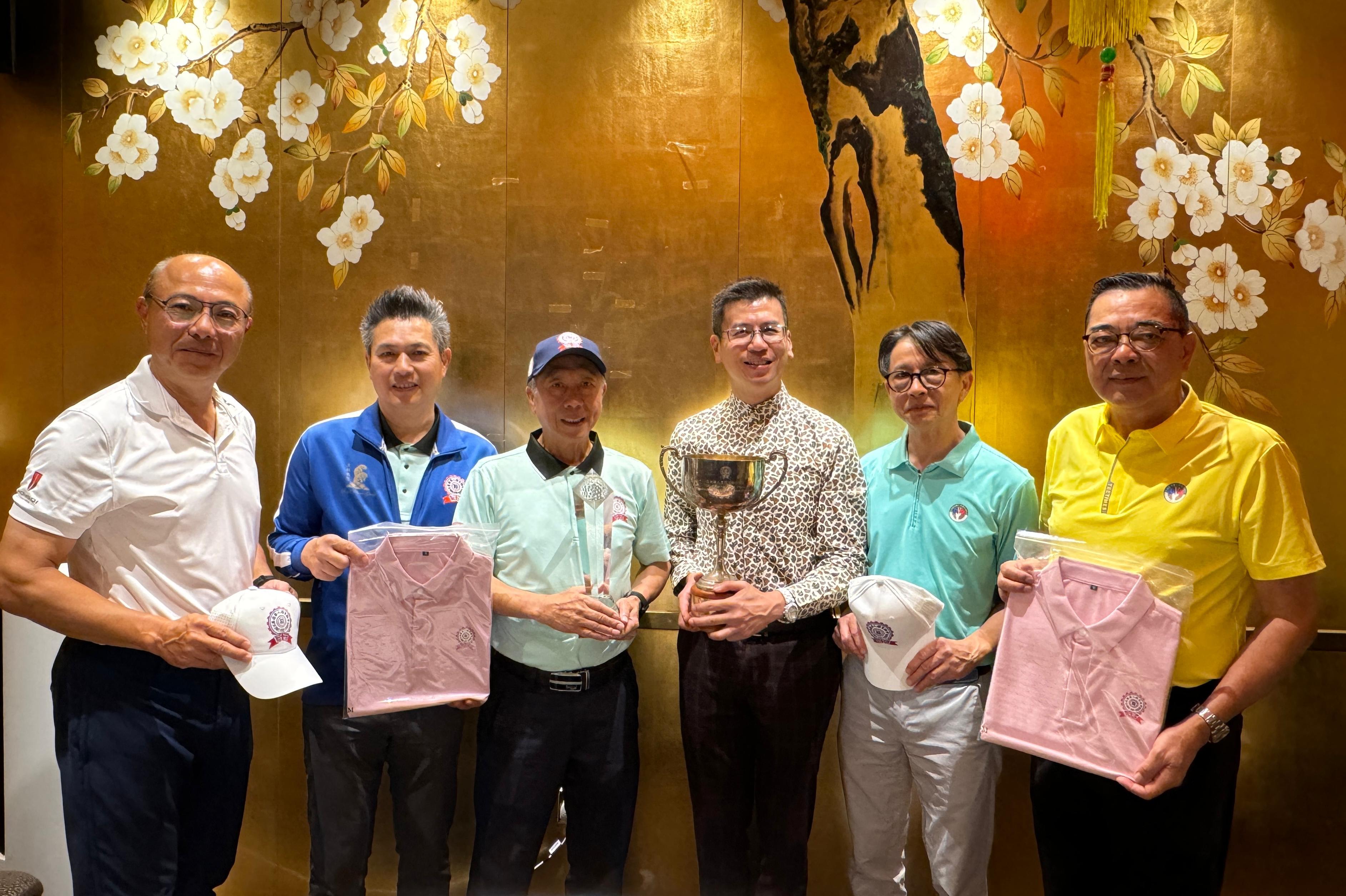 To commemorate the 27th anniversary of the establishment of Hong Kong Special Administrative Region, the Hong Kong Economic and Trade Office, London (London ETO) supported the 24th UK Chinese Golf Open 2024 by sponsoring the Reunification Cup special prize. Photo shows the Director-General of the London ETO, Mr Gilford Law (third right), and committee members at the event.