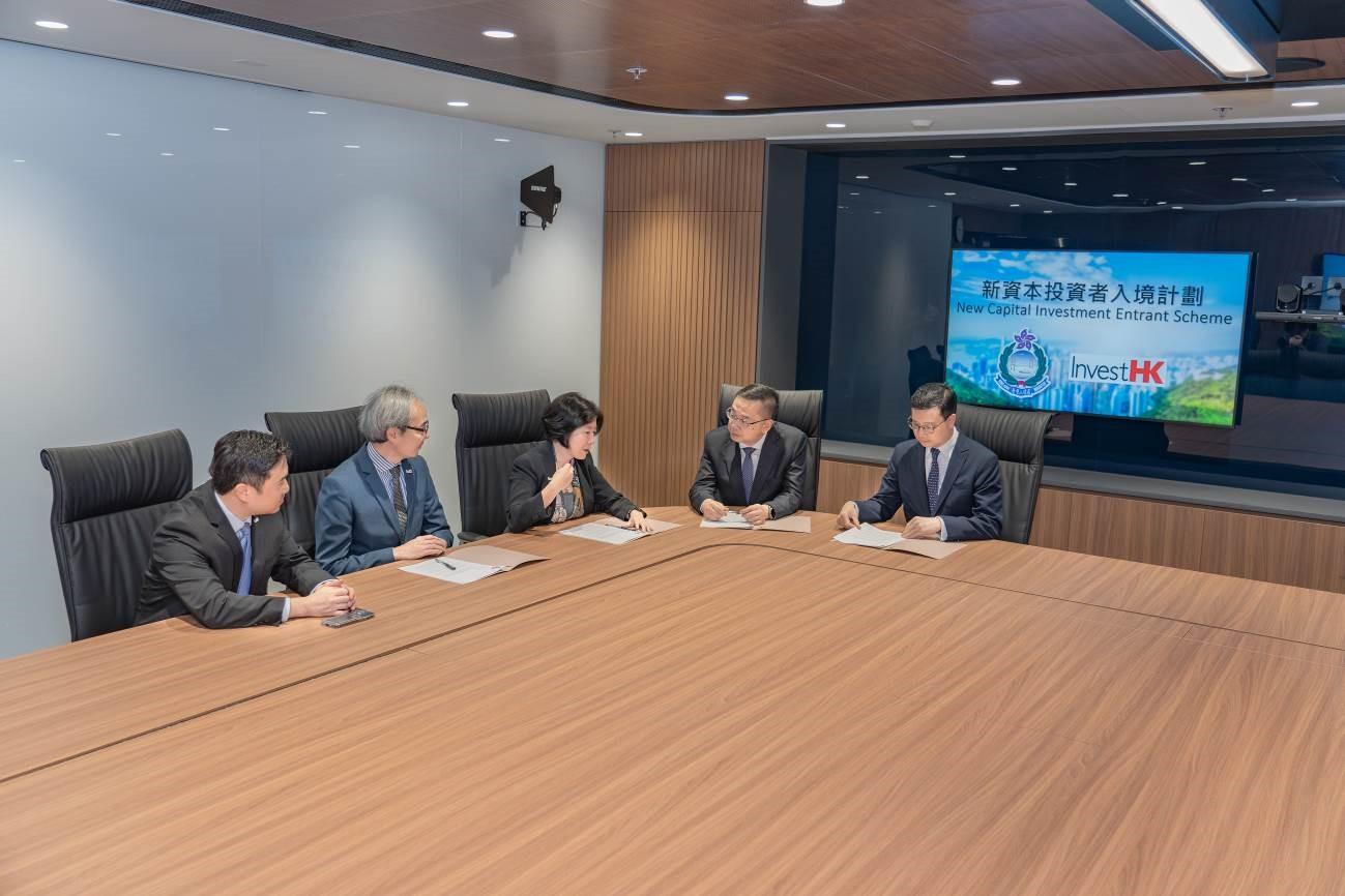 The Director of Immigration, Mr Benson Kwok (second right), along with the Director-General of Invest Hong Kong, Ms Alpha Lau (third left); the Deputy Director of Immigration (Control, Visa, and Documents), Mr Wallace Ching (first right); the Chief Executive Officer of New Capital Investment Entrant Scheme Office, Mr Joseph Yu (second left); and the Senior Vice President, Strategy & Planning, Mr Alan Lo (first left), convene to discuss initiatives focused on improving business travel efficiency for foreign travellers.