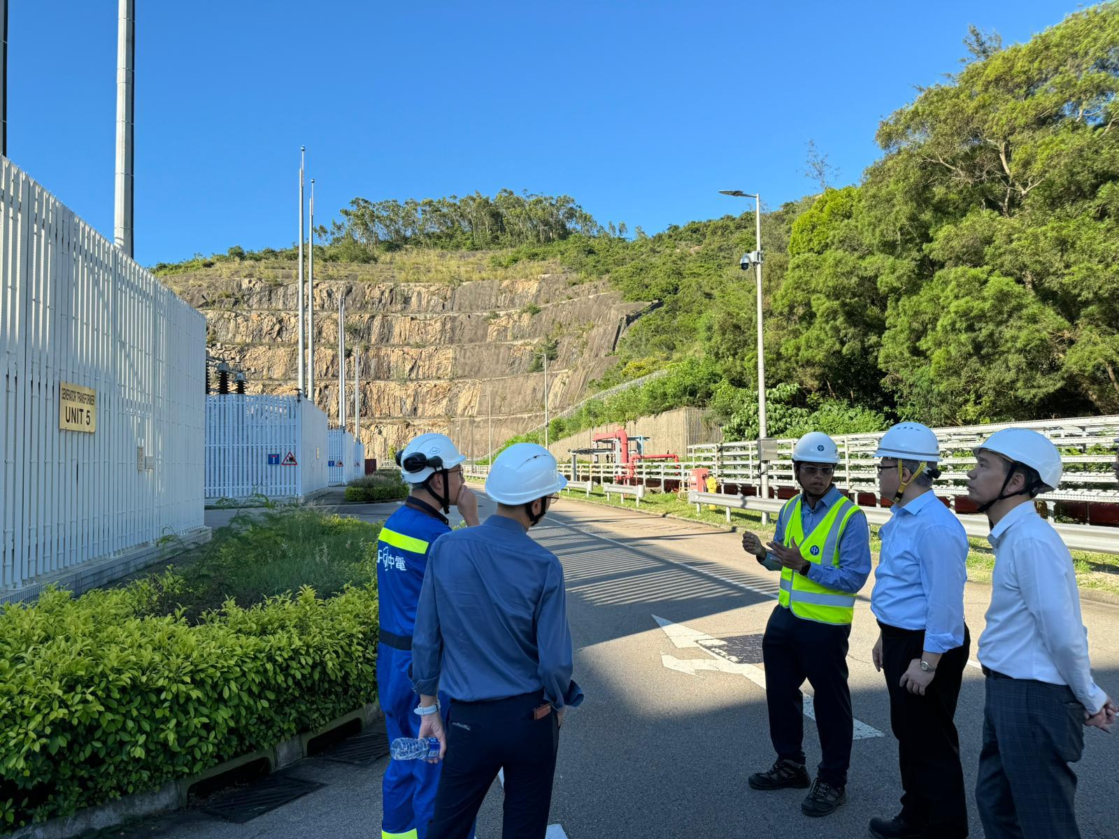 The Director of Electrical and Mechanical Services, Mr Poon Kwok-ying (second right), today (July 3) visits the Black Point Power Station to understand about the existing configuration of the lightning protection system of power stations and requests CLP Power Hong Kong Limited to accelerate the review and the associated improvement works for further enhancing the capability of power supply system to withstand adverse weather.