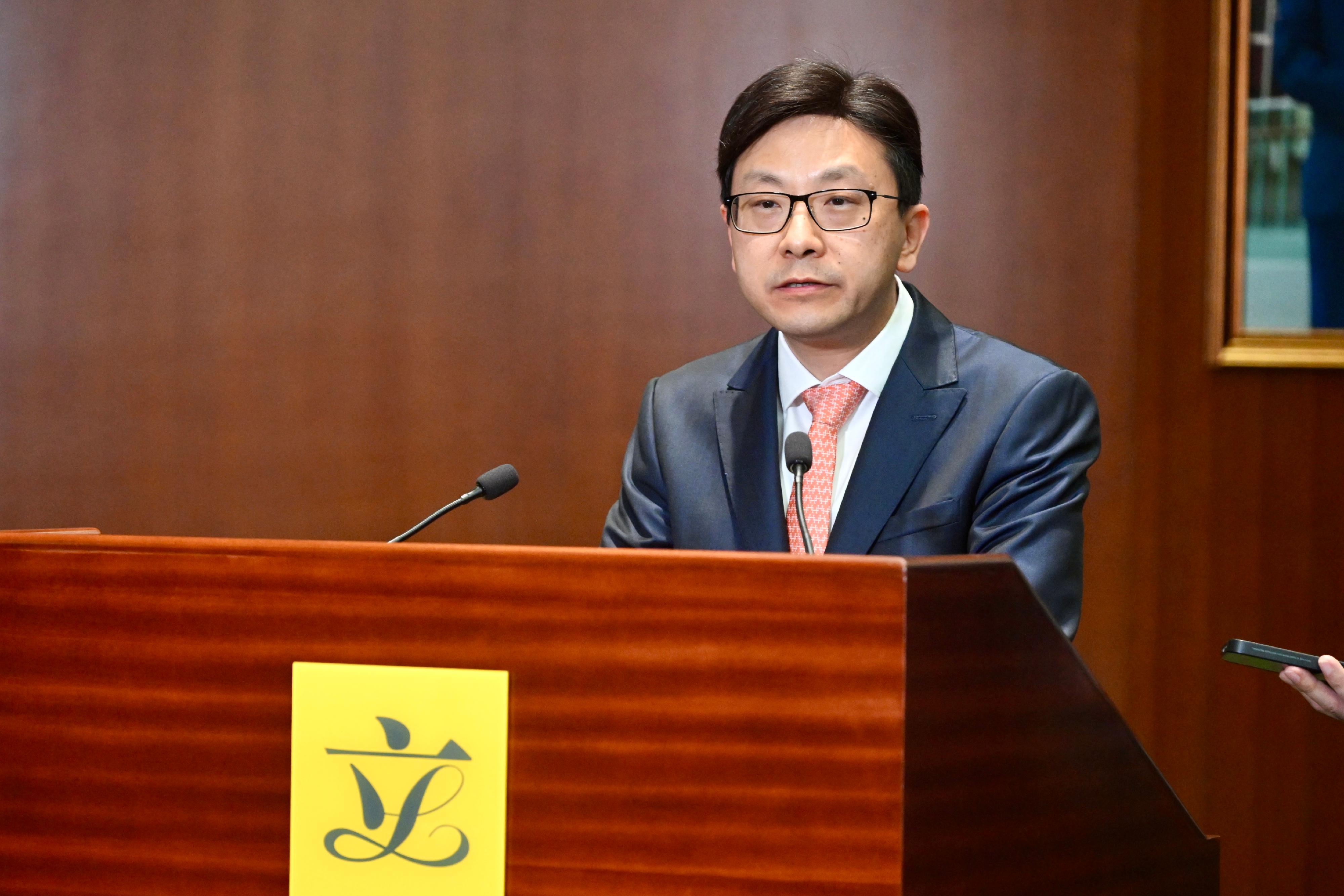 The Secretary for Labour and Welfare, Mr Chris Sun, meets the media after the passage of the Social Workers Registration (Amendment) Bill 2024 by the Legislative Council this afternoon (July 3).