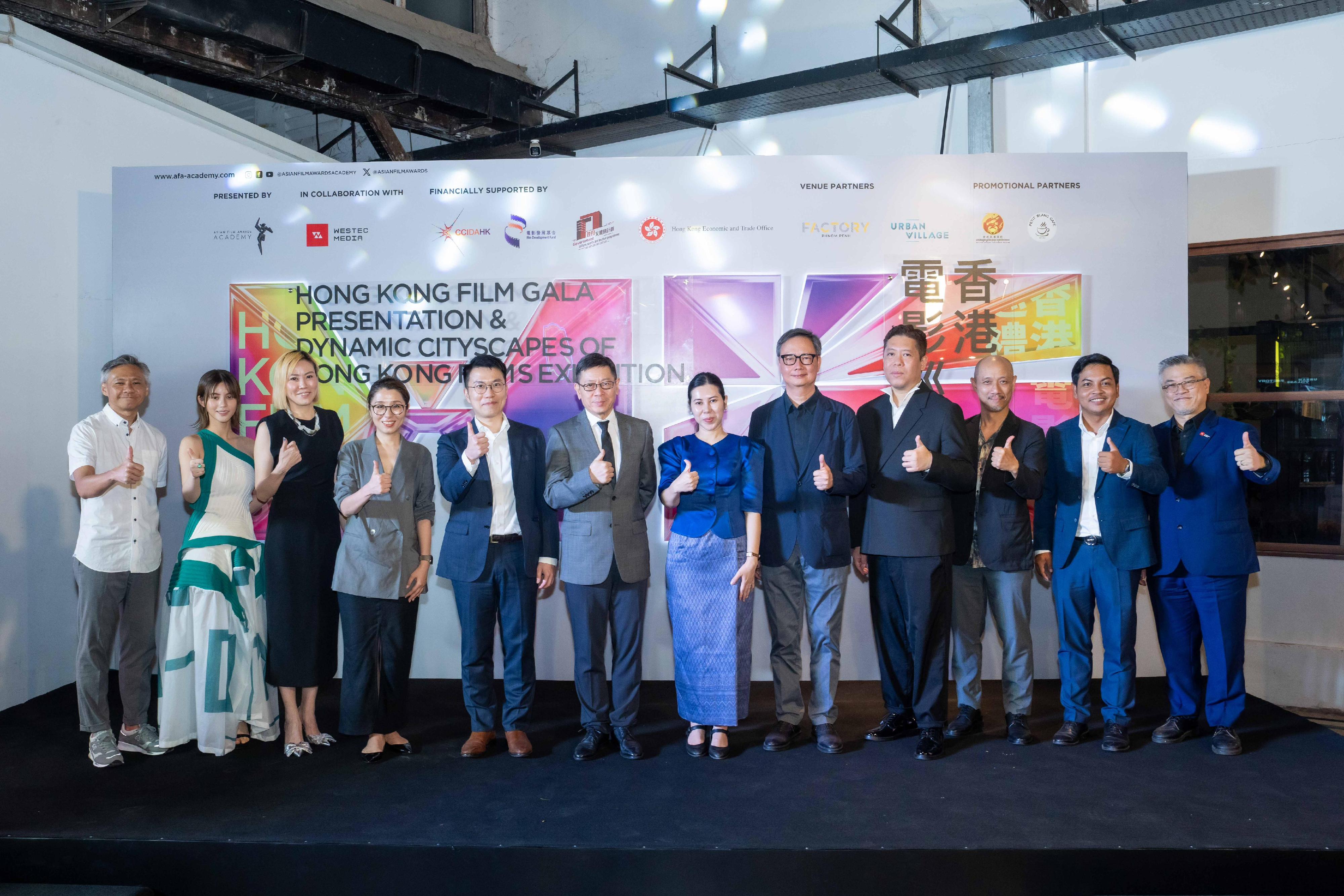 The Hong Kong Economic and Trade Office in Bangkok (Bangkok ETO) collaborated with the Asian Film Awards Academy (AFAA) to launch the first Hong Kong Film Gala Presentation in Phnom Penh, Cambodia, today (July 3). Picture shows the Counsellor of the Chinese Embassy in Cambodia, Mr Lin Ruihua (sixth left); the Secretary of State of the Ministry of Culture and Fine Arts of Cambodia, Ms Pen Moni Makara (sixth right); the Director of Bangkok ETO, Mr Parson Lam (fifth left); the Executive Director of the AFAA, Ms Josie Lin (fourth left); the Chief Executive Officer of Westec Media Limited of Cambodia, Mr Michael Chai (first right); and other officiating guests at the opening ceremony.