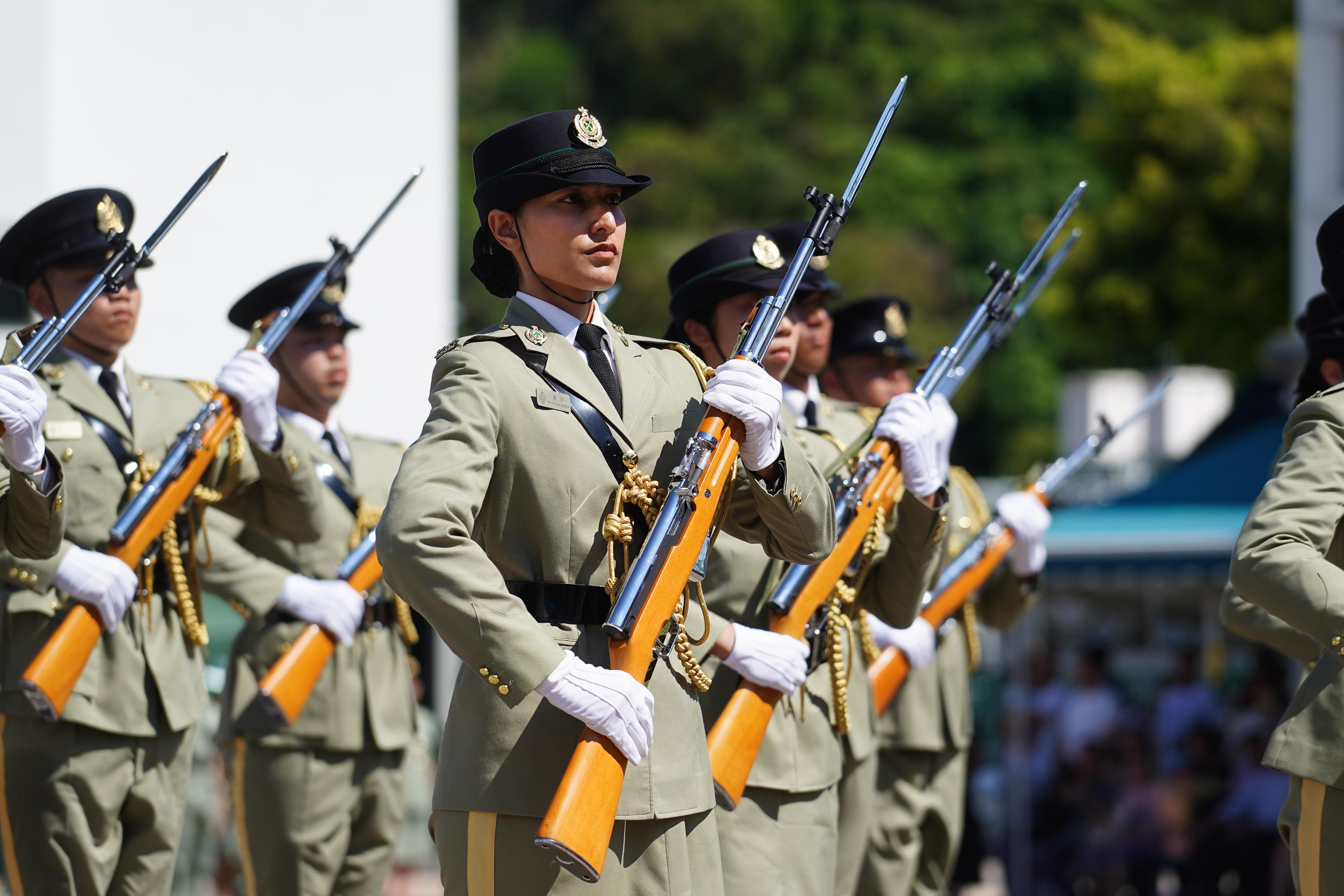 Hong Kong Customs Passing-out Parade was held today (July 5). Photo shows members of the Customs and Excise Department Guards of Honour performing an exhibition drill.