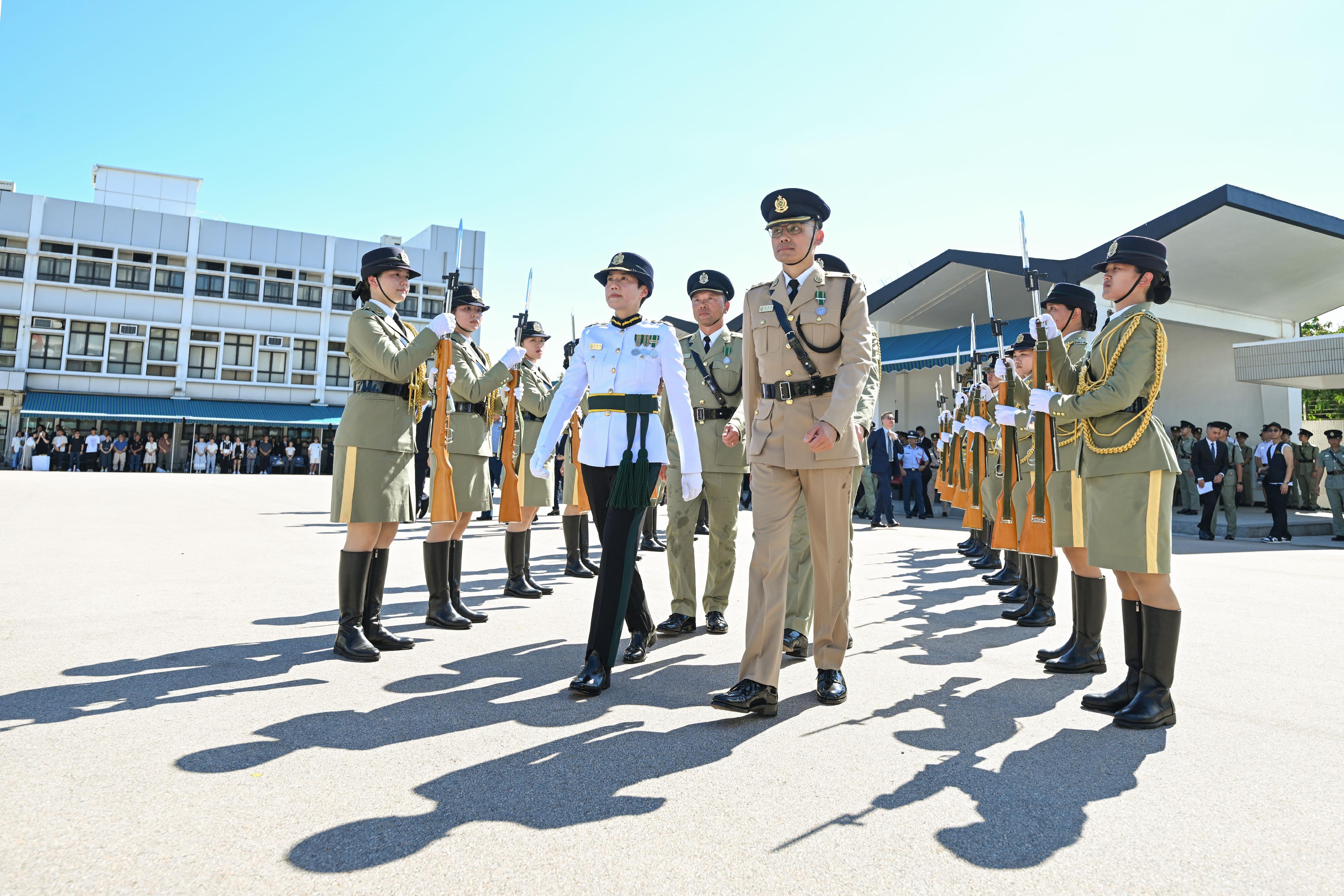 Hong Kong Customs Passing-out Parade was held today (July 5). Photo shows the Commissioner of Customs and Excise, Ms Louise Ho (front row, left), inspecting the Customs and Excise Department Guards of Honour.