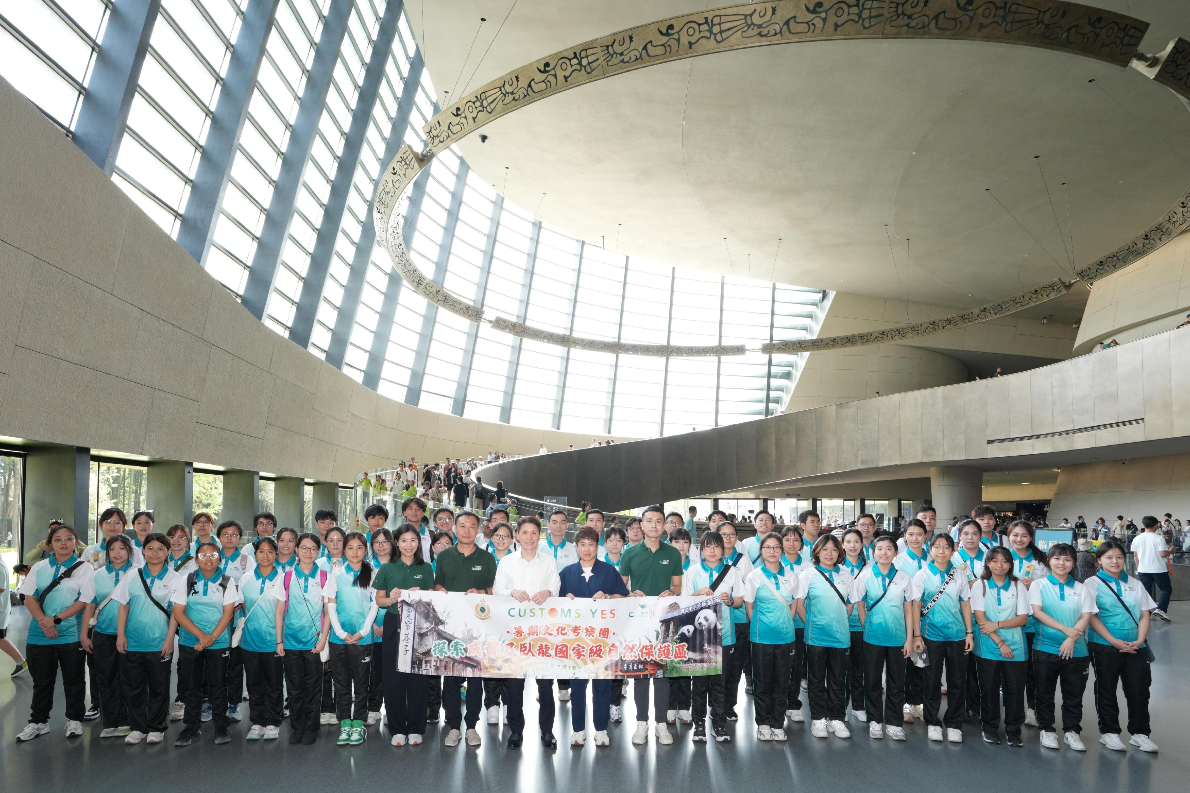 The Deputy Commissioner (Control and Enforcement) of Customs and Excise, Mr Mark Woo, today (July 5) led members of "Customs YES" to visit the Sanxingdui Museum. Photo shows Mr Woo (first row, eighth left); the Director of the Executive Committee of "Customs YES", Mr Yang Bin (first row, seventh left) and other members on the visit and "Customs YES" members.