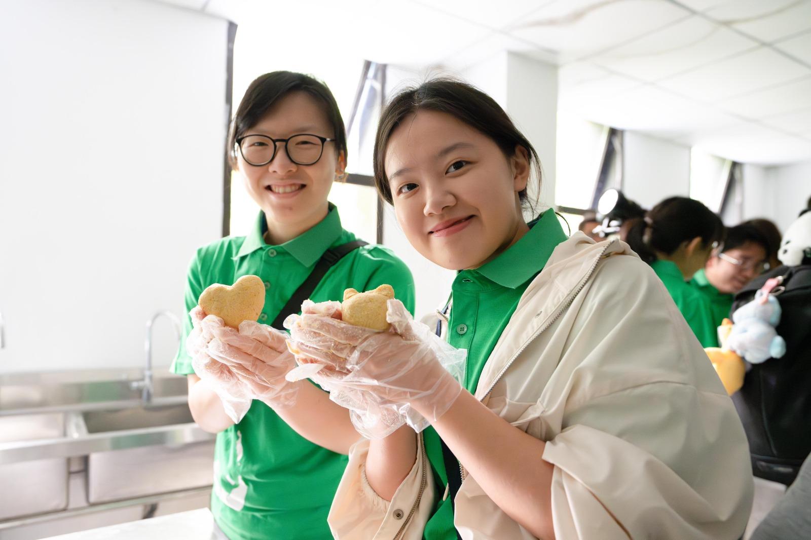 Members of "Customs YES" prepared specialised panda feed in the China Giant Panda Garden Shenshuping Base in Wolong on July 2.