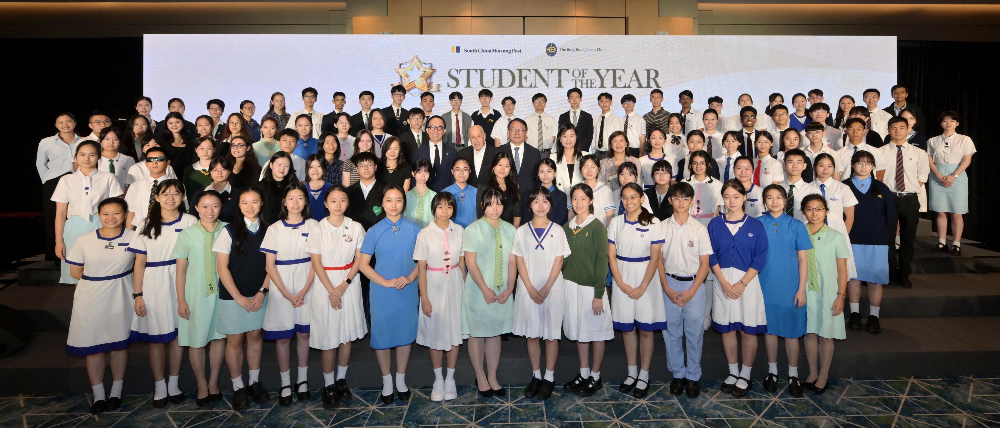 The Chief Secretary for Administration, Mr Chan Kwok-ki, attended the Student of the Year Awards 2023/24 Presentation Ceremony today (July 6). Photo shows Mr Chan (third row, eleventh left); the Chief Executive Officer of the South China Morning Post (SCMP), Ms Catherine So (third row, twelfth left); the Executive Director, Charities and Community of The Hong Kong Jockey Club, Dr Gabriel Leung (third row, ninth left); the Editor-in-Chief of the SCMP, Ms Tammy Tam (third row, eighth left); and guests and students at the ceremony.