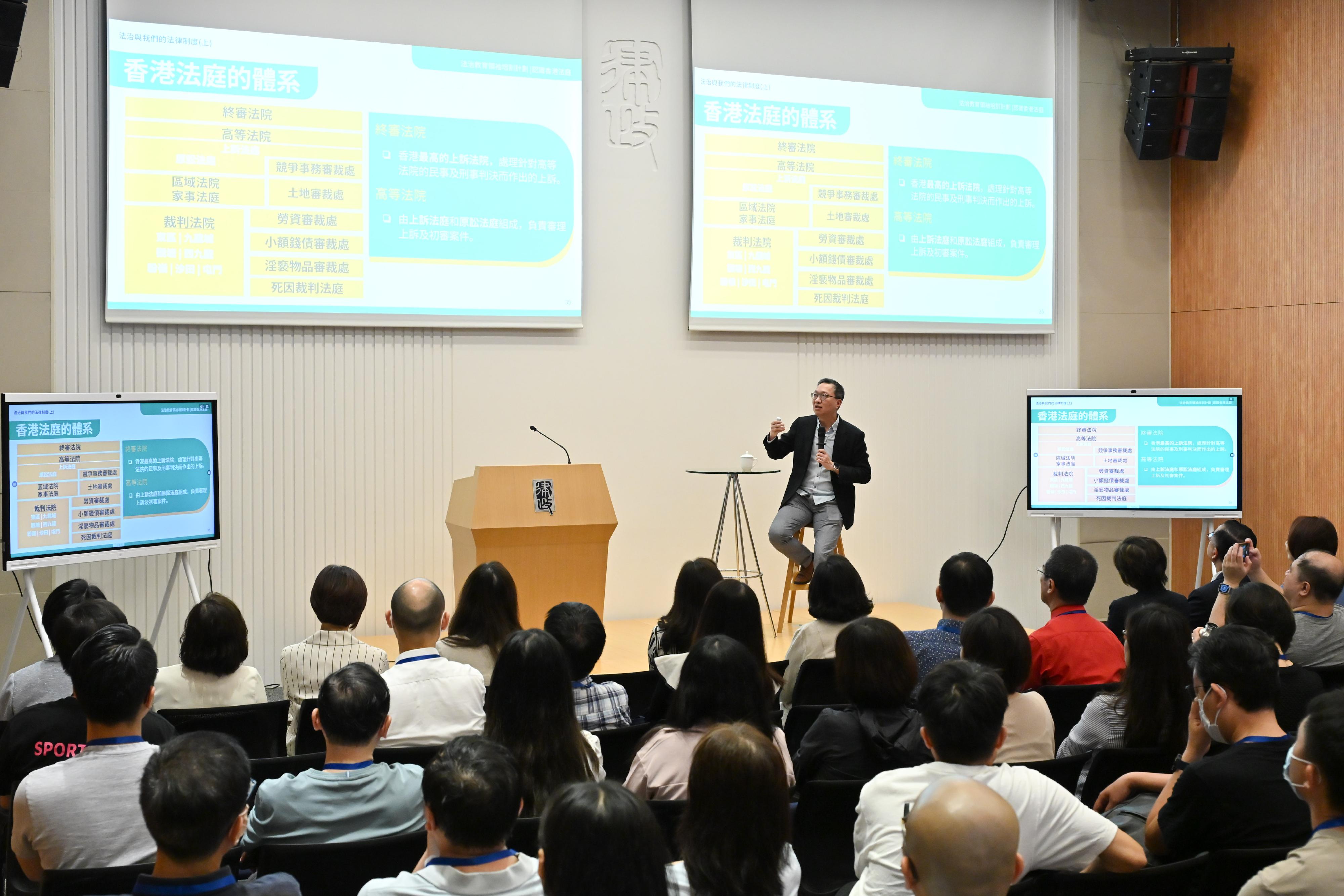 The second phase of the Rule of Law Education (ROLE) Stars Train-the-Leaders Programme was officially launched today (July 6) by the Department of Justice. Photo shows the Secretary for Justice, Mr Paul Lam, SC, giving a lecture on the topic "Rule of law and our legal system".
