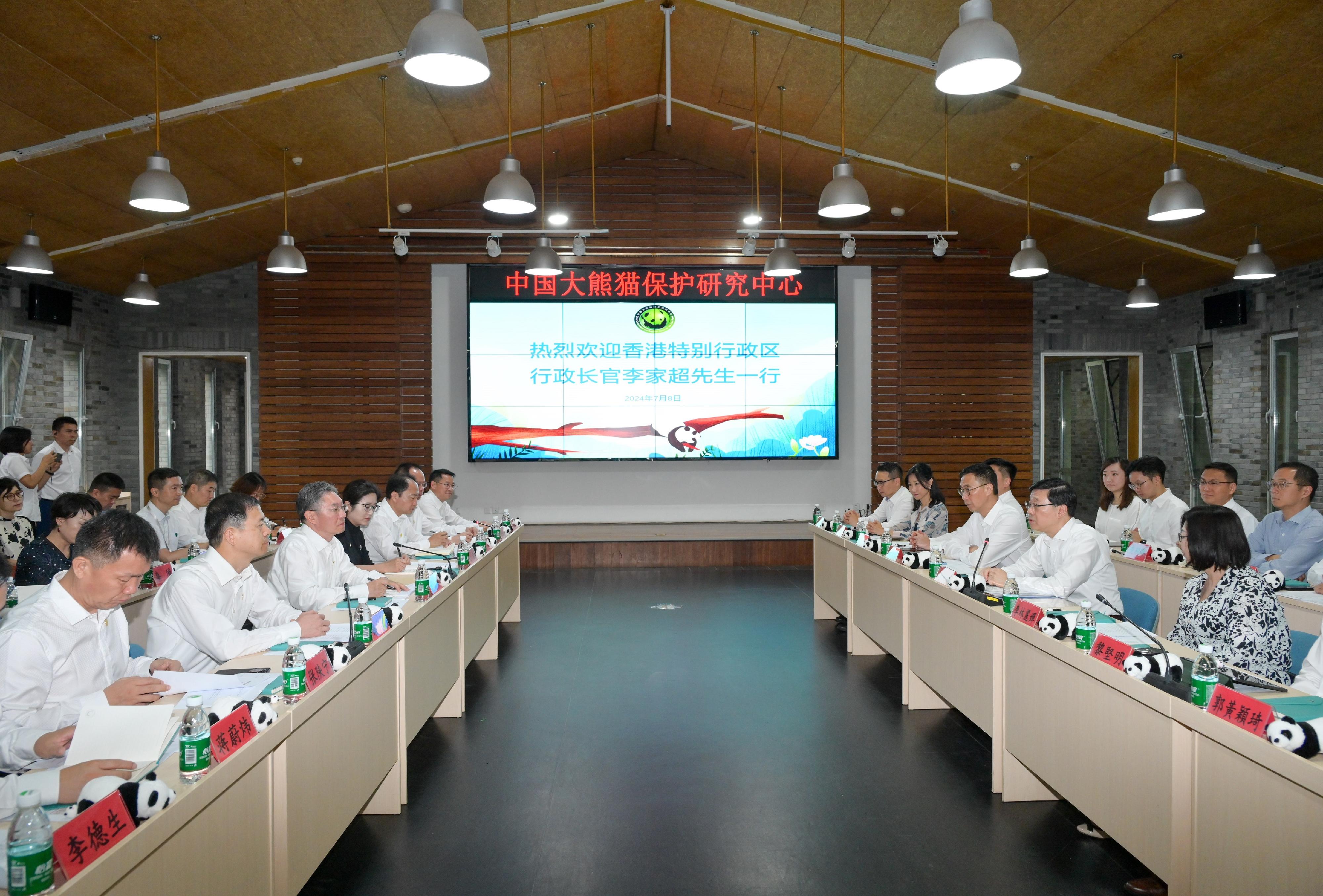 The Chief Executive, Mr John Lee, and his wife Mrs Janet Lee started their visit to Sichuan today (July 8). Photo shows Mr Lee and his wife Mrs Lee (second and first right); and the Secretary for Culture, Sports and Tourism, Mr Kevin Yeung (third right), visiting the Dujiangyan Base of the China Conservation and Research Centre for the Giant Panda to receive a briefing from the Deputy Director and member of the Leading Party Group of the National Forestry and Grassland Administration, Mr Li Yunqing (third left), on the efforts for giant panda conservation and the co-operation with Hong Kong.
