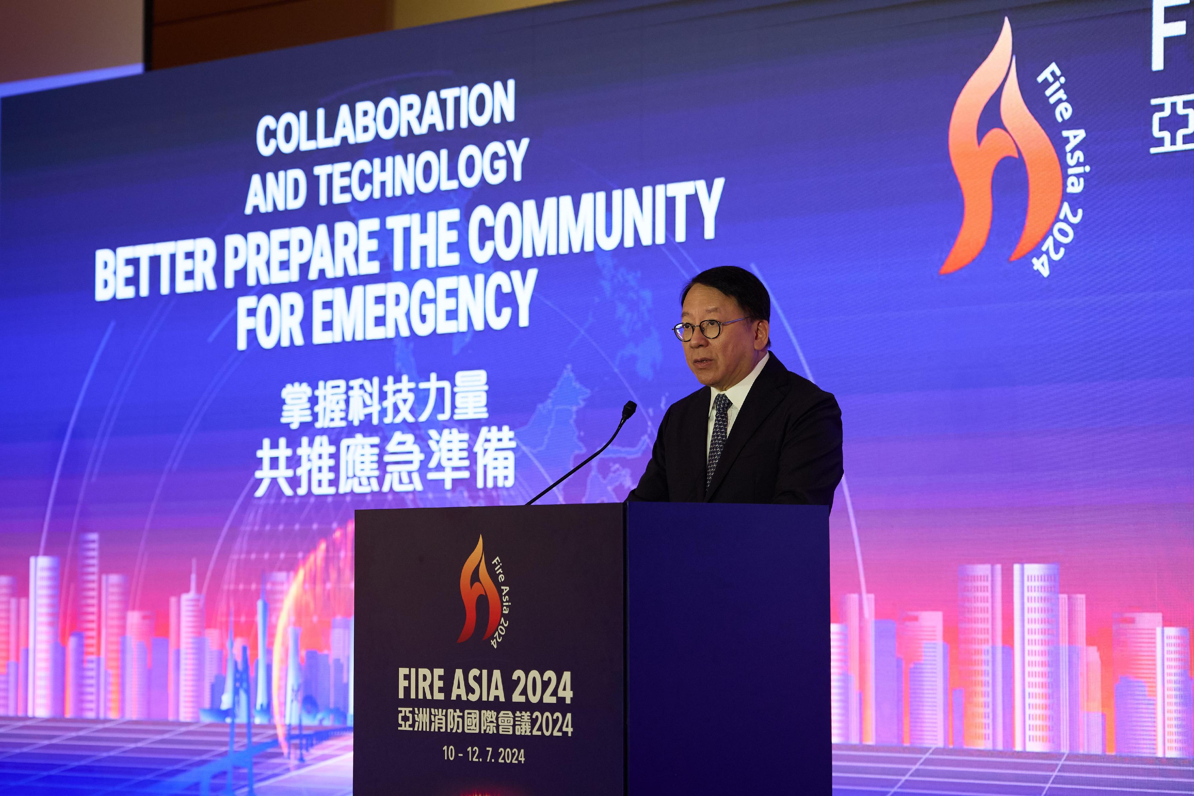 About 600 experts and delegates in emergency response, paramedic services, medical professions and fire engineering from various countries and regions are taking part in the Fire Asia 2024 international conference being held at the Hong Kong Convention and Exhibition Centre from today (July 10) to July 12. Photo shows the Chief Secretary for Administration, Mr Chan Kwok-ki, delivering a speech at the opening ceremony.