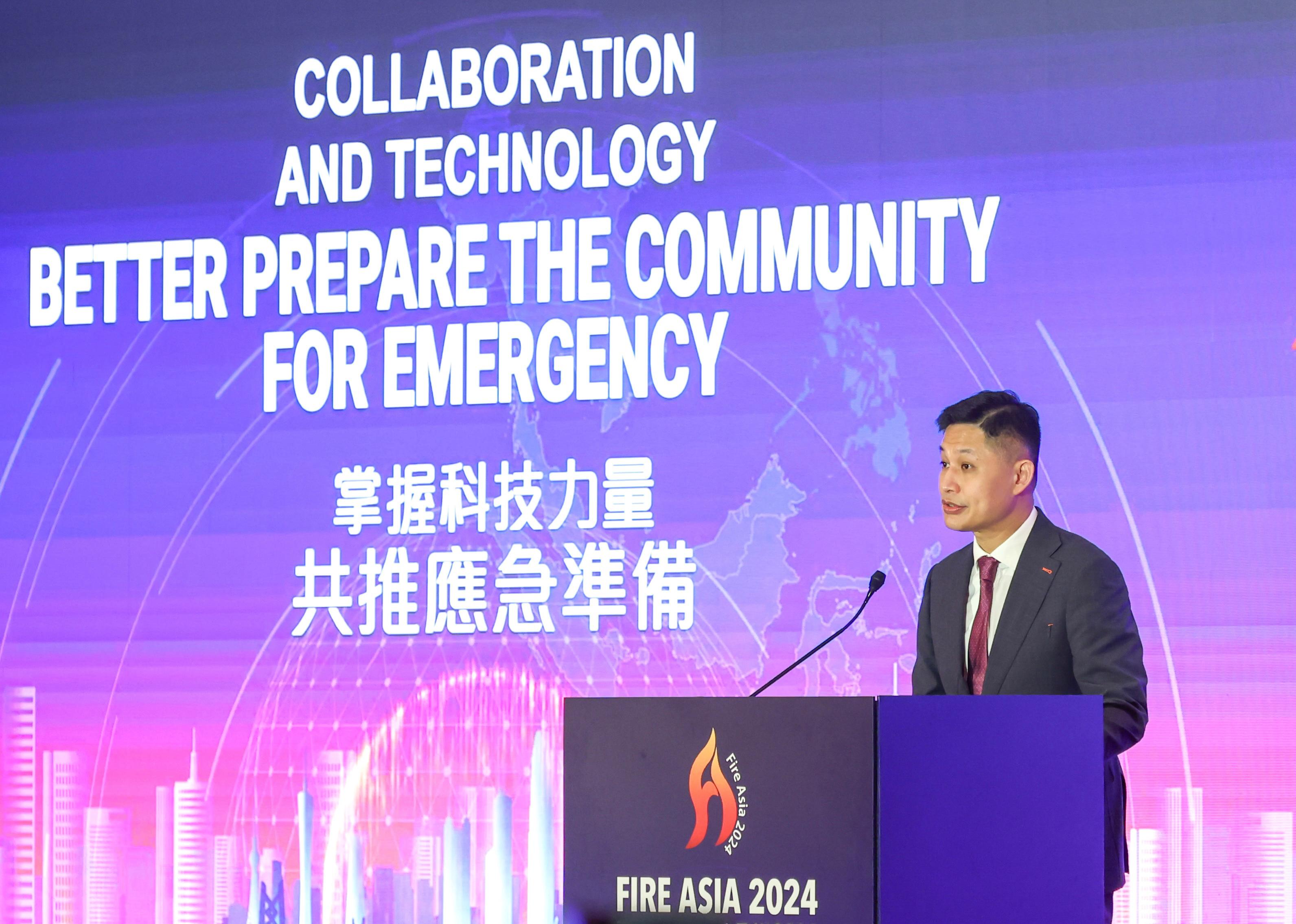 About 600 experts and delegates in emergency response, paramedic services, medical professions and fire engineering from various countries and regions are taking part in the Fire Asia 2024 international conference being held at the Hong Kong Convention and Exhibition Centre from today (July 10) to July 12. Photo shows the Director of Fire Services, Mr Andy Yeung, delivering a speech at the opening ceremony.