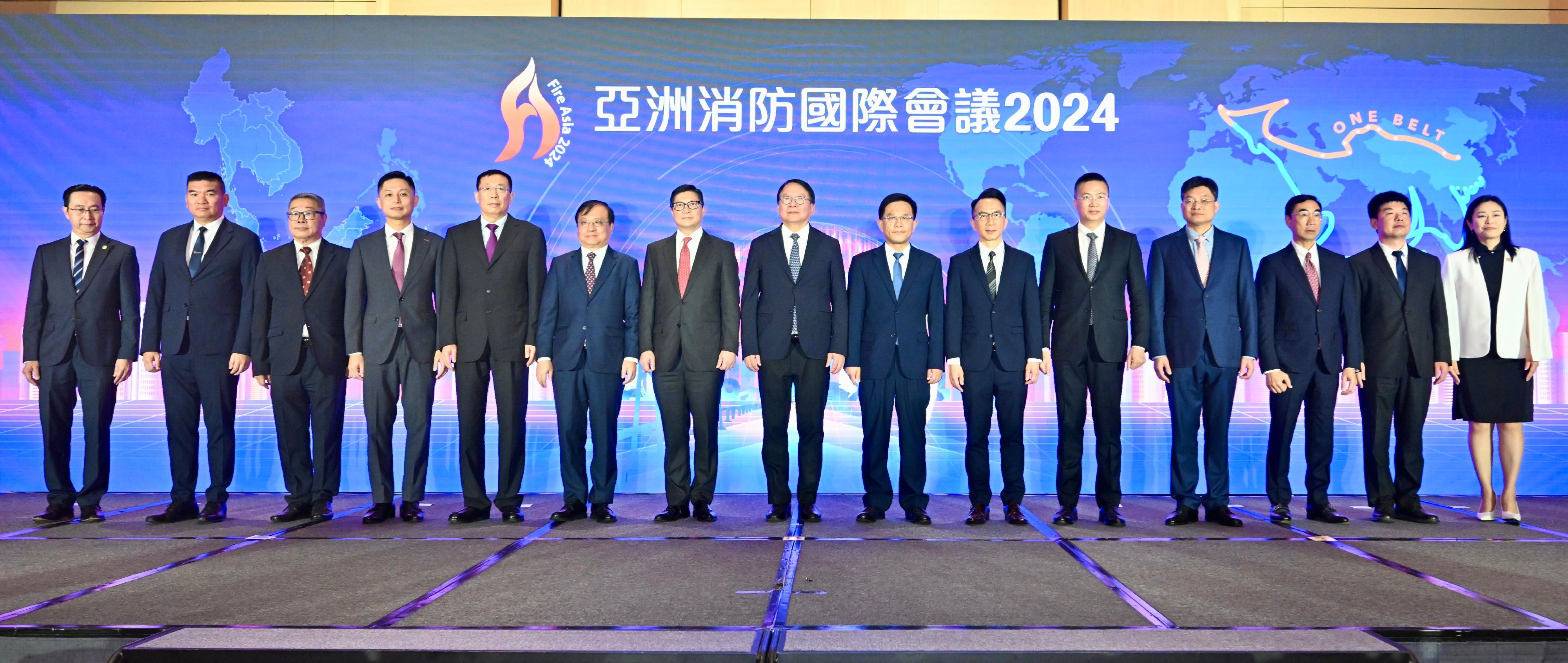 The Chief Secretary for Administration, Mr Chan Kwok-ki, attended Fire Asia 2024 today (July 10). Photo shows (from fourth left) the Director of Fire Services, Mr Andy Yeung; Deputy Director General of the National Fire and Rescue Administration of People's Republic of China Mr Luo Yongqiang; Deputy Commissioner of the Office of the Commissioner of the Ministry of Foreign Affairs of the People's Republic of China in the Hong Kong Special Administrative Region (HKSAR) Mr Fang Jianming; the Secretary for Security, Mr Tang Ping-keung; Mr Chan; the Secretary General of the Liaison Office of the Central People's Government in the HKSAR, Mr Wang Songmiao; the Permanent Secretary for Security, Mr Patrick Li; Deputy Director of the Bureau of Liaison of the Office for Safeguarding National Security of the Central People's Government in the HKSAR Mr Xie Zhixiang; Deputy President of China People's Police University Mr Wu Lizhi, and other guests.