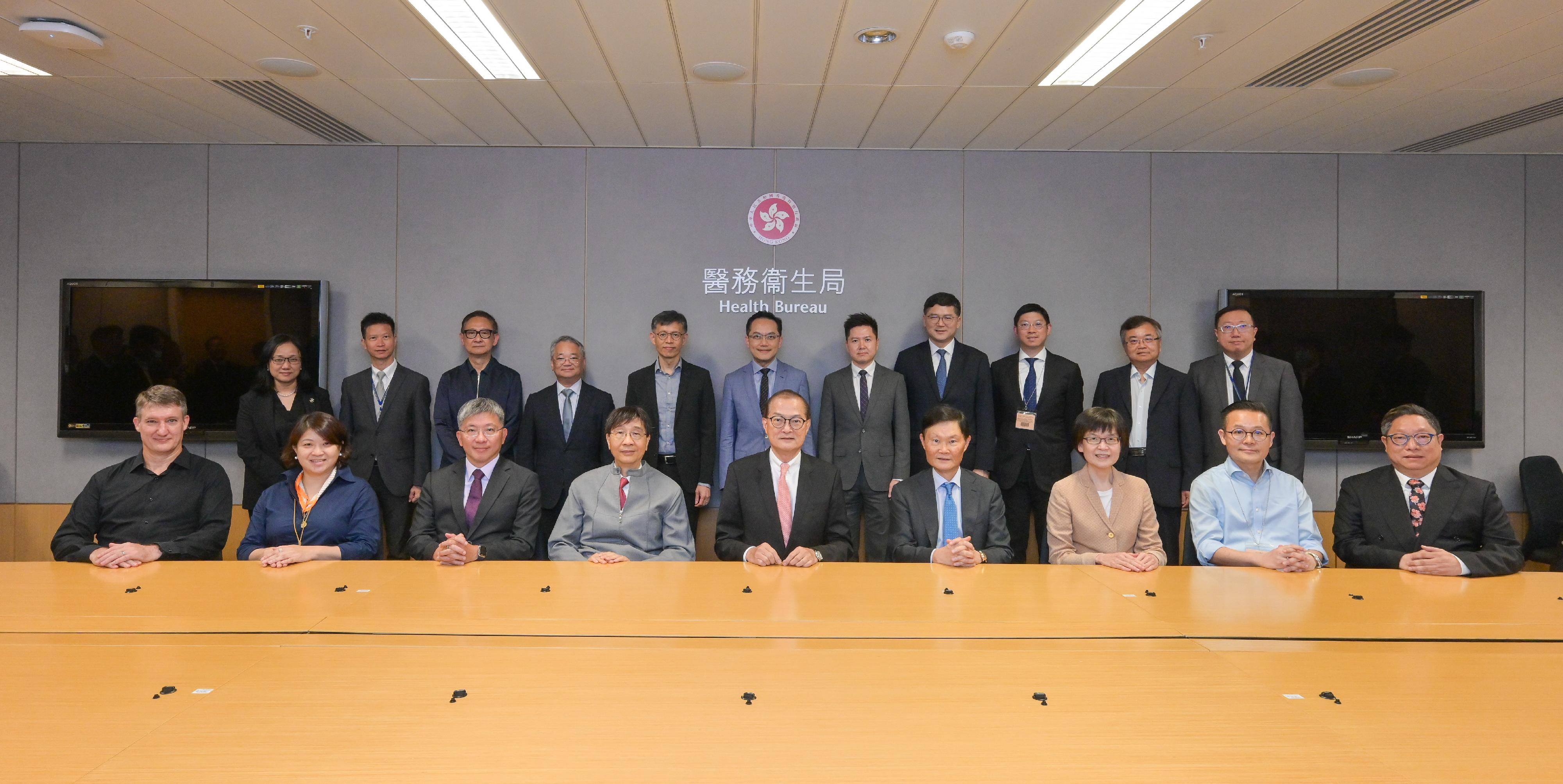 The Secretary for Health, Professor Lo Chung-mau, convened the ninth meeting of the High Level Steering Committee on Antimicrobial Resistance today (July 11). Photo shows Professor Lo (front row, centre); the Permanent Secretary for Health, Mr Thomas Chan (front row, third left); the Under Secretary for Health, Dr Libby Lee (front row, second left); the Director of Health, Dr Ronald Lam (back row, centre); the Director of Agriculture, Fisheries and Conservation, Mr Mickey Lai (back row, fifth left); the Chief Executive of the Hospital Authority, Dr Tony Ko (back row, fourth right), and other members and officials before the meeting.