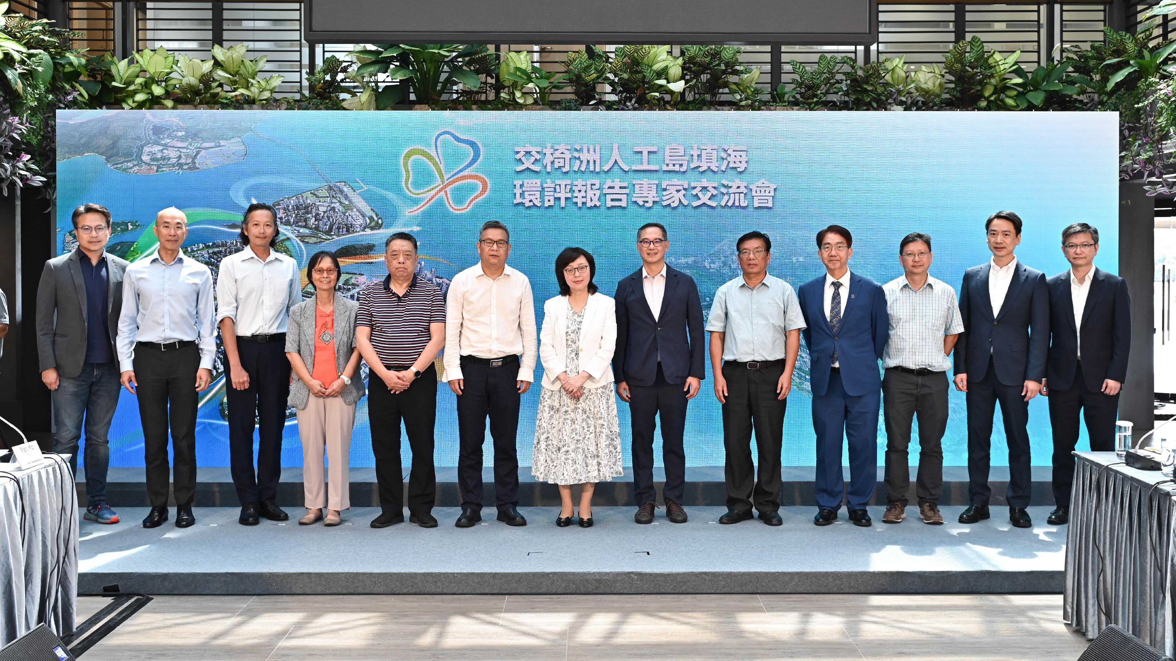 The Development Bureau, the Civil Engineering and Development Department and the Planning Department today (July 11) exchanged views with environmental and ecological experts from the Mainland on the EIA for the reclamation of the Kau Yi Chau Artificial Islands. The Secretary for Development, Ms Bernadette Linn (centre), the Permanent Secretary for Development (Works), Mr Ricky Lau (sixth right); the Director of Civil Engineering and Development, Mr Michael Fong (second left); the Director of Planning, Mr Ivan Chung (second right) are pictured with academician of the Chinese Academy of Engineering, the Director of the State Key Laboratory of Environmental Criteria and Risk Assessment, Chinese Research Academy of Environmental Sciences, Mr Wu Fengchang (sixth left); the former Director of the Third Institute of Oceanography of the State Oceanic Administration, Ministry of Natural Resources, Dr Yu Xingguang (fifth right); and the former Director of the National Marine Environmental Monitoring Center of the Ministry of Ecology and Environment, Dr Guan Daoming (fifth left); the President of the Macau University of Science and Technology, Professor Joseph Lee (fourth right); Chair Professor of the School of Science and Technology of the Hong Kong Metropolitan University Professor Nora Tam (fourth left); the Associate Head of Department of Biology of Hong Kong Baptist University, Professor Qiu Jianwen (third right); and the founder of the Eco Institute, Mr Samson So (third left).