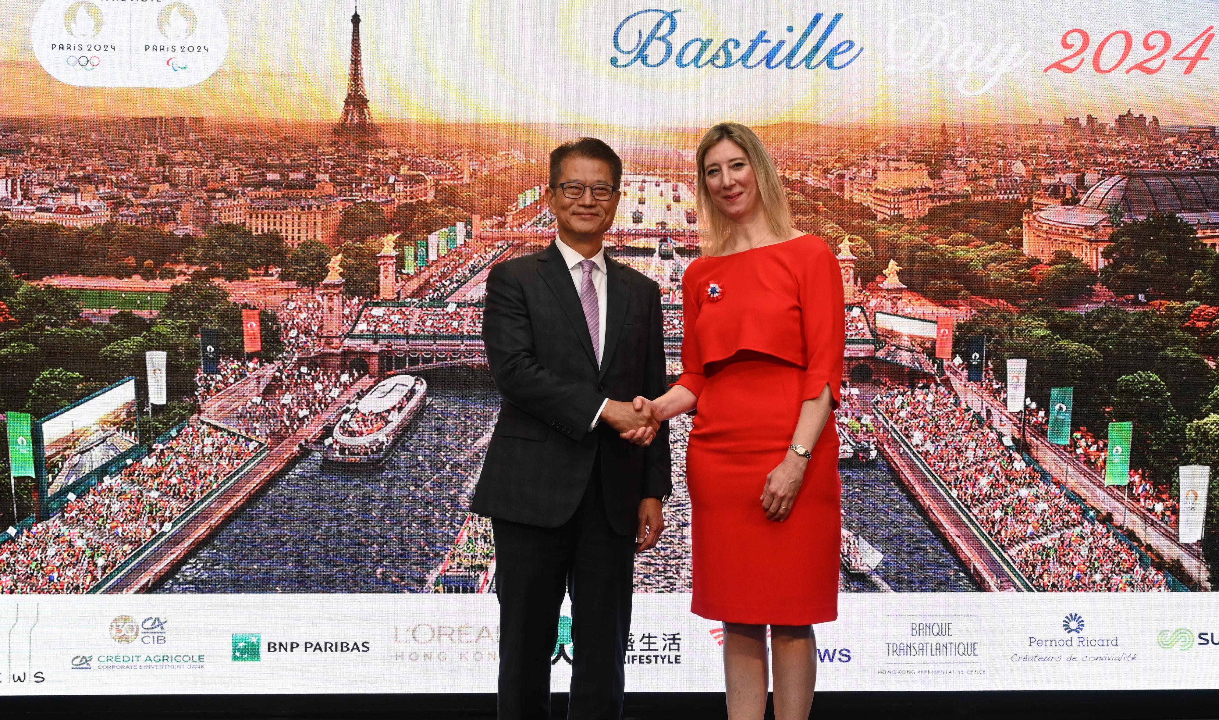 The Financial Secretary, Mr Paul Chan, attended the reception in celebration of 2024 Bastille Day this evening (July 12). Photo shows Mr Chan (left) and the Consul General of France in Hong Kong and Macau, Ms Christile Drulhe (right) at the reception.