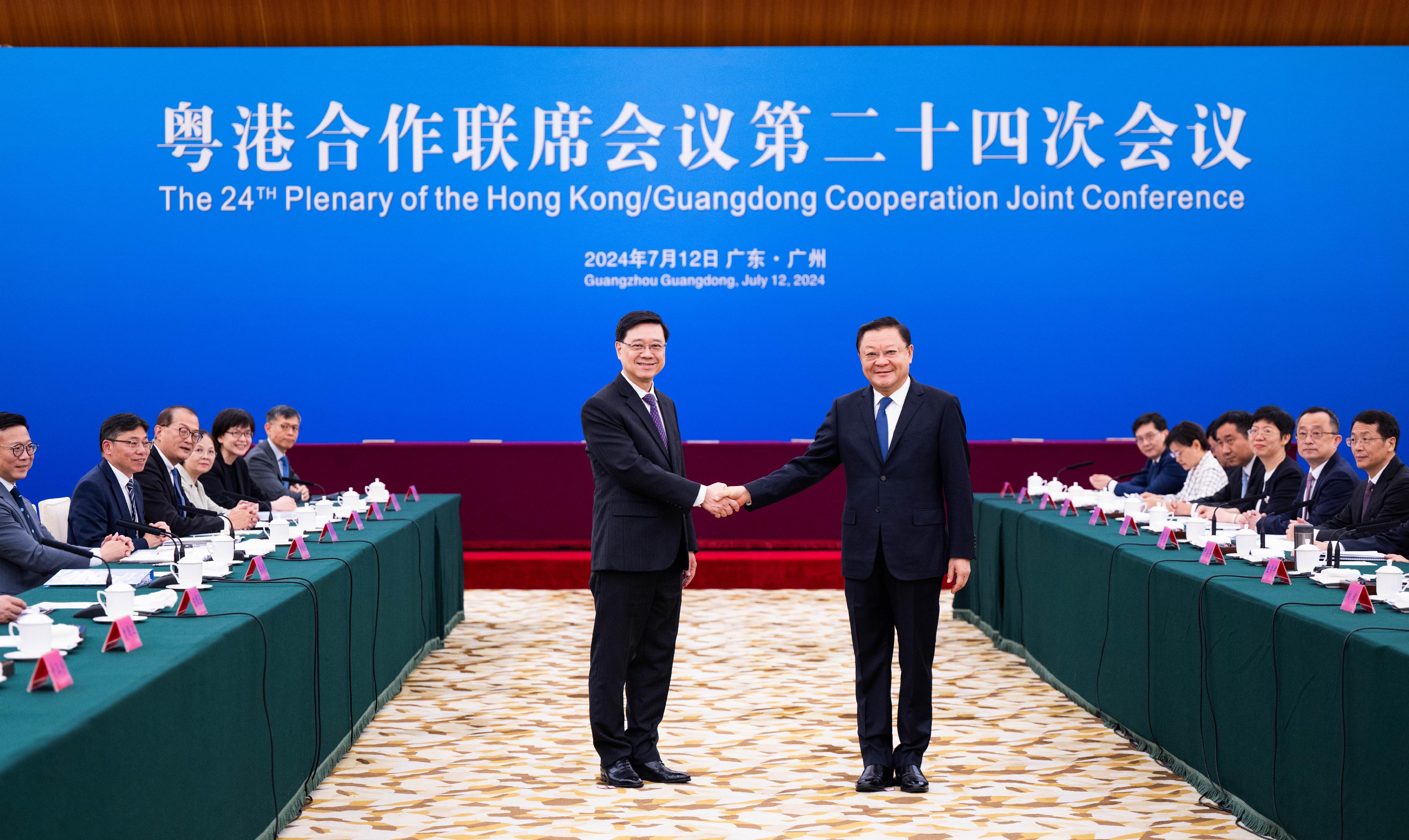 The Chief Executive, Mr John Lee, led a Hong Kong Special Administrative Region Government delegation to attend the 24th Plenary of the Hong Kong/Guangdong Co-operation Joint Conference in Guangzhou today (July 12). Photo shows Mr Lee (left) and the Governor of Guangdong Province, Mr Wang Weizhong (right) before the Plenary.